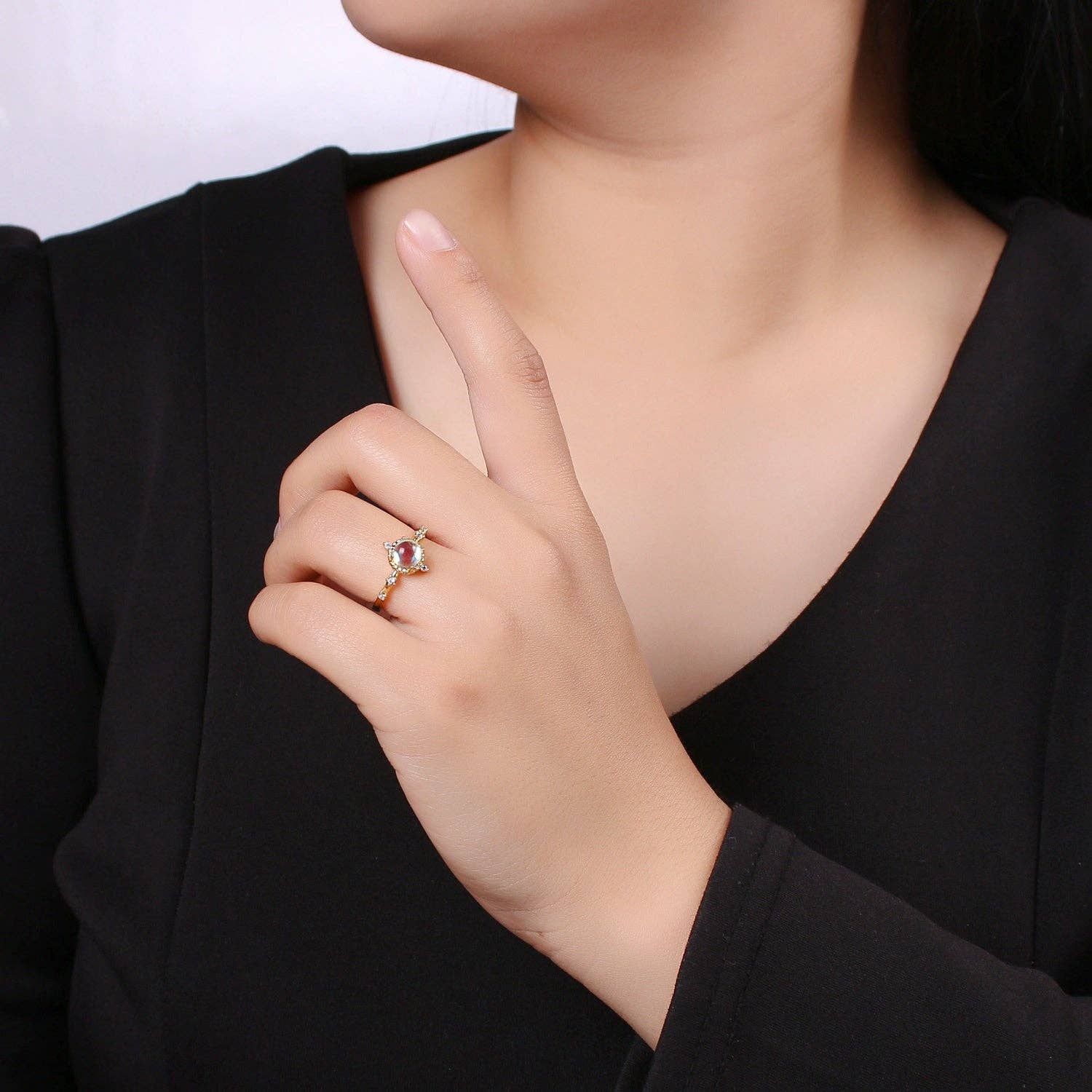 Dainty adjustable ring featuring a celestial moonstone design by Private label, set against a neutral background.