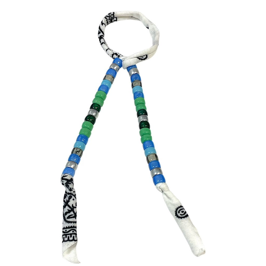 Beadstein x Lets Bag It beaded bag charms with colorful beads and decorative accents hanging from a chain.