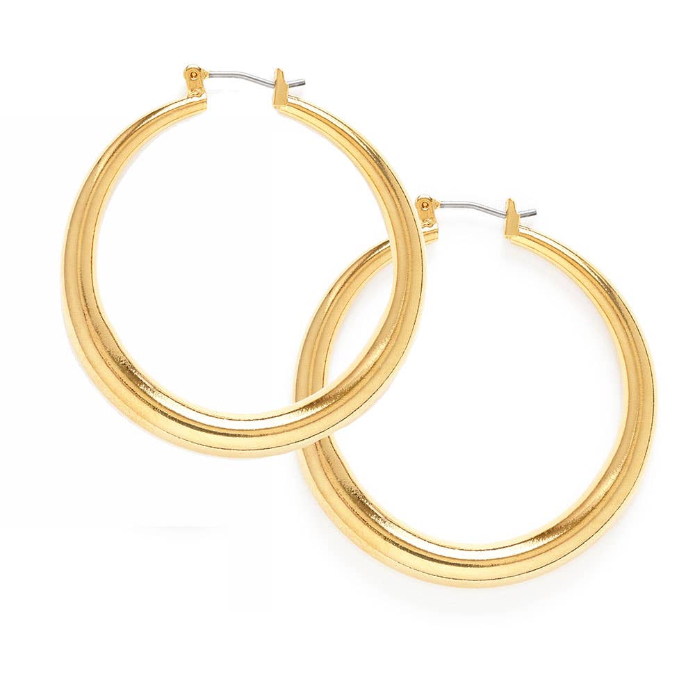 Large Maria hoops earring by Amano Studio featuring bold, circular gold hoops with a smooth finish.