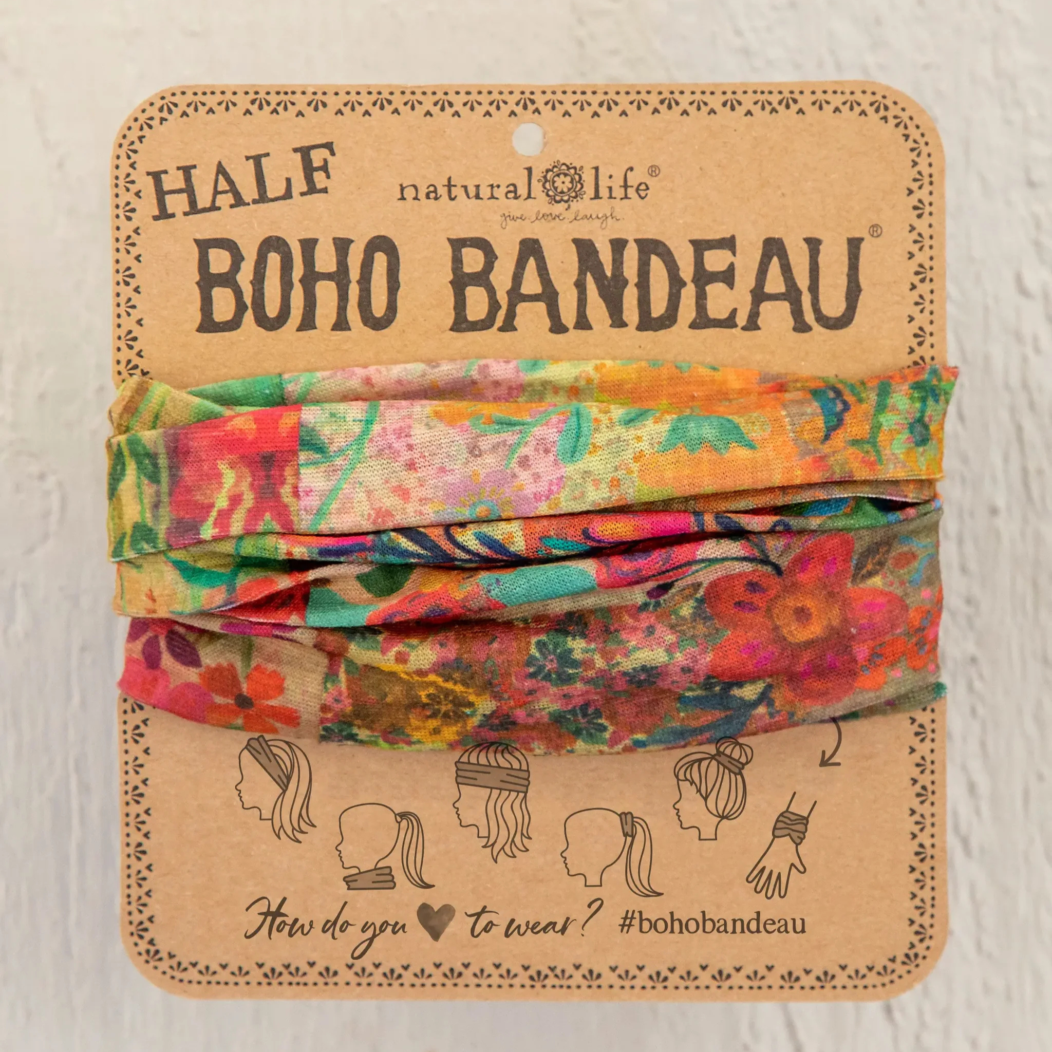 Natural Life Half Boho Bandeau headband in pink patchwork fabric, featuring a stylish bohemian design and soft, stretchy material.
