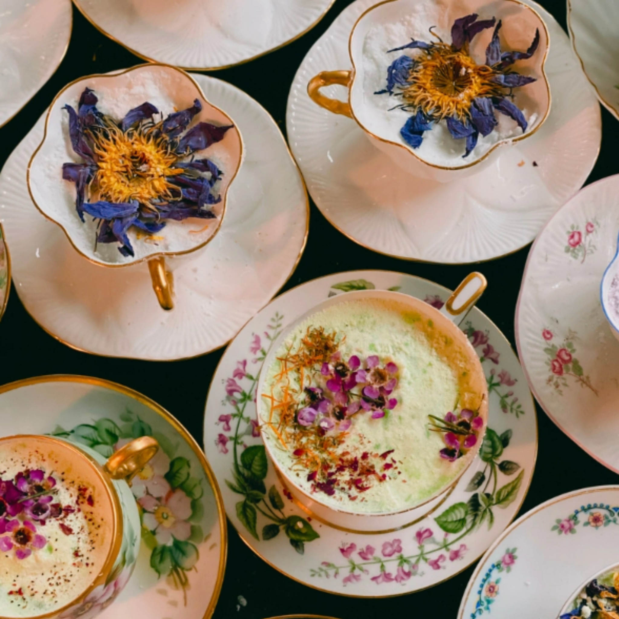 Antique tea cup bath bombs in pastel colors, featuring floral designs from Witchy Woman World Apothecary.