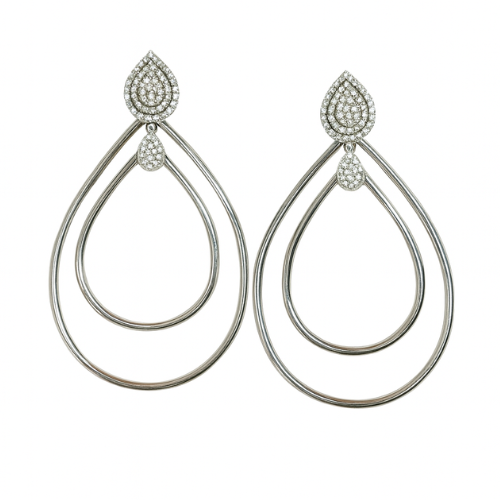Sterling silver tear drop hoop earrings with a sleek, modern design, showcasing their elegant shine and shape.