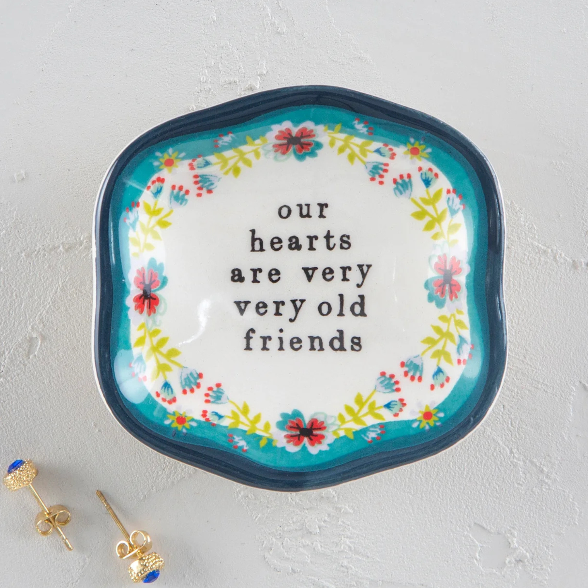 Natural Life artisan trinket dish tray featuring colorful, handcrafted designs perfect for jewelry or small treasures.