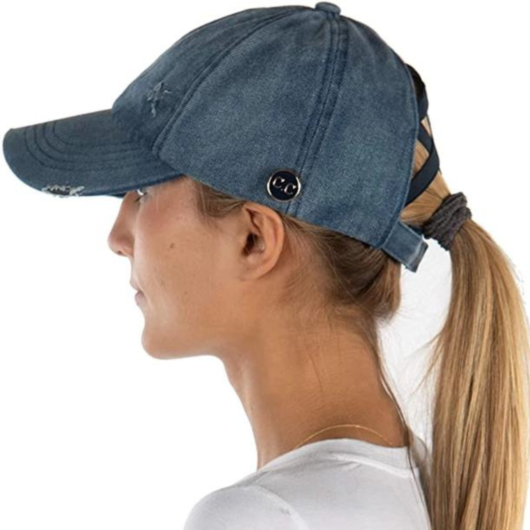 Denim criss cross ponytail cap with button details from Funky Junque, showing the hat's stylish design and button accents.