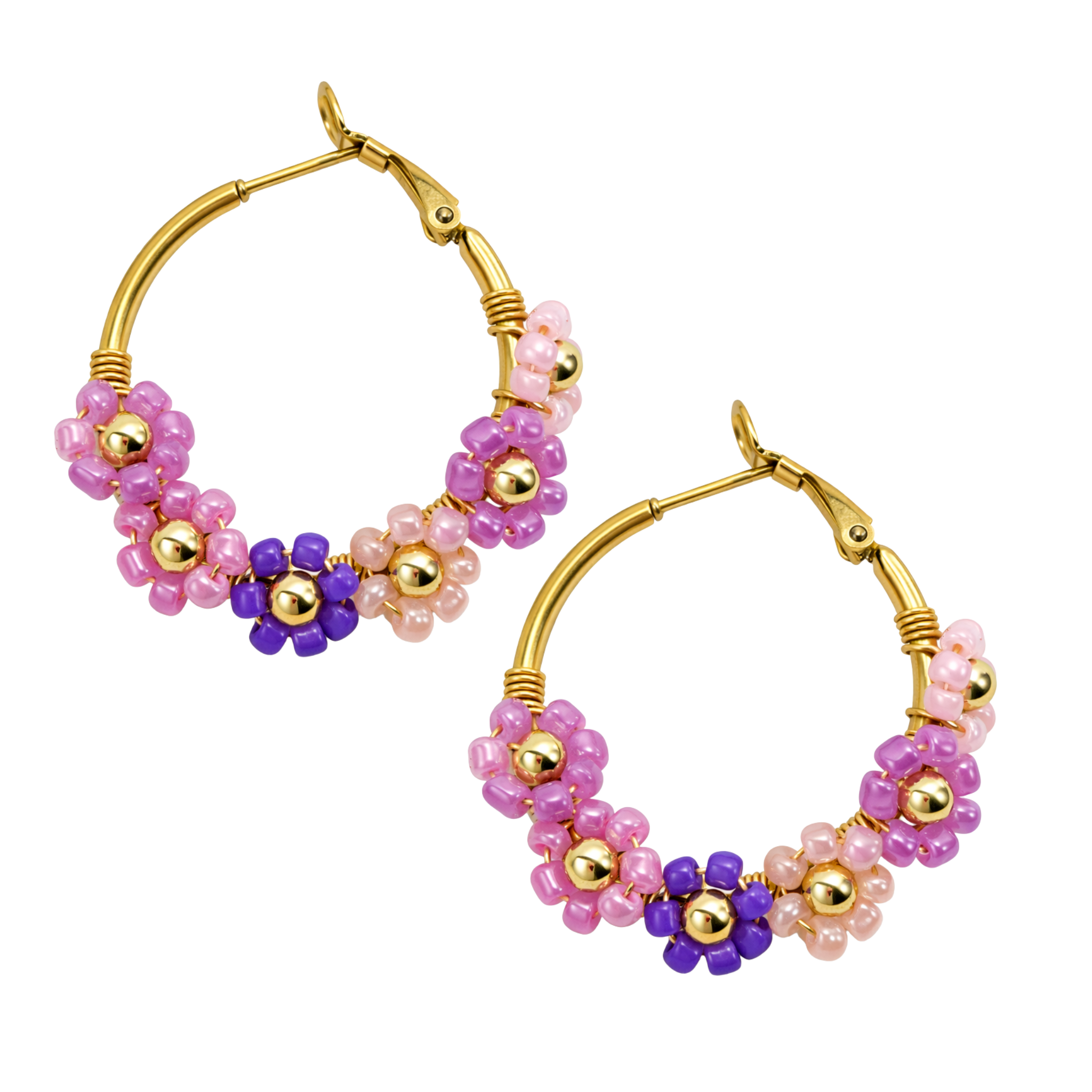 Silver floral hoop earrings by Gemelli featuring intricate flower designs on round metal hoops.