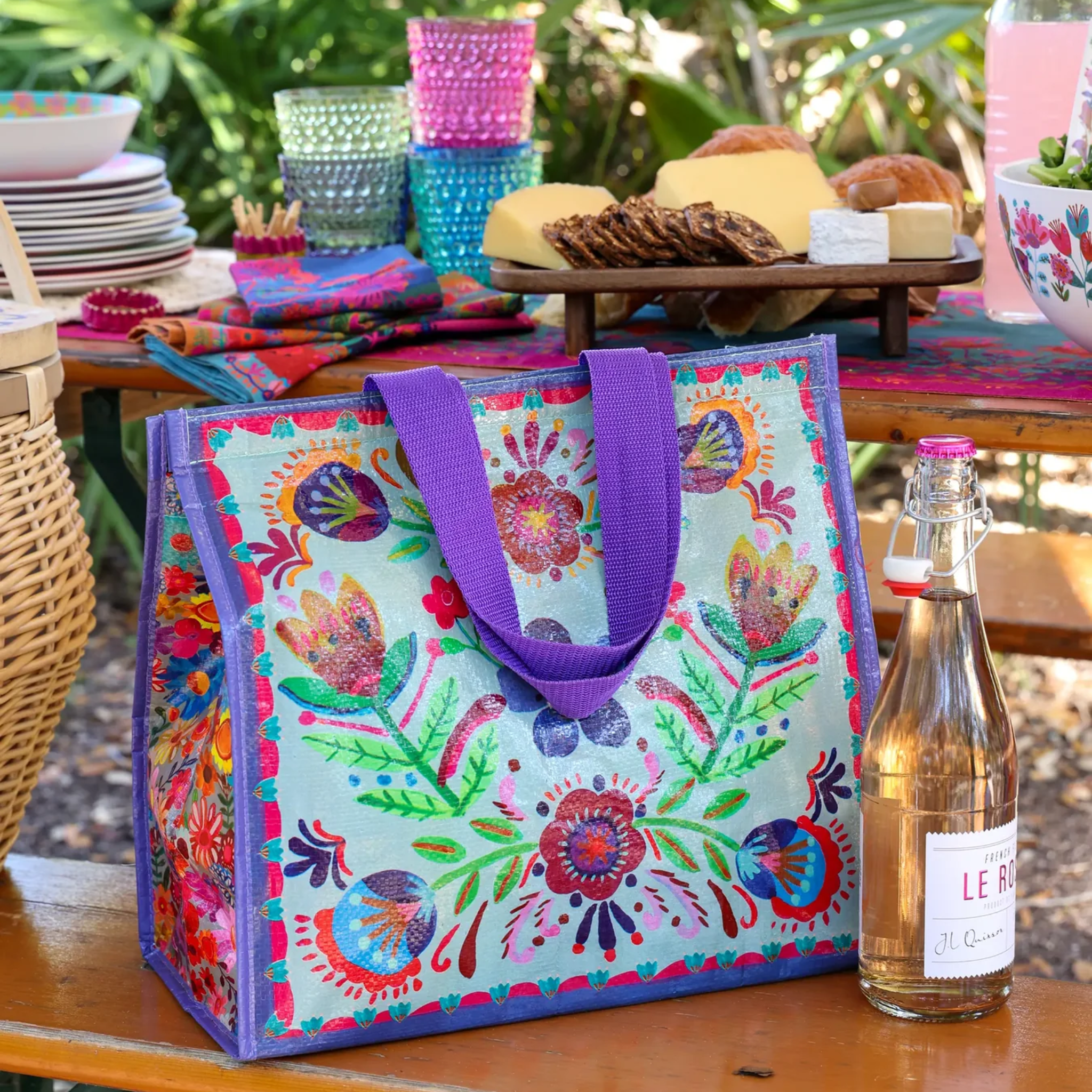 Natural Life insulated cooler tote in Dusty Blue Folk Flower with floral pattern, perfect for picnics and outdoor gatherings.