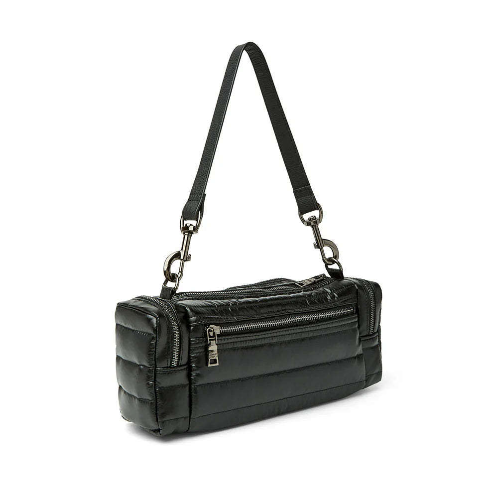 Black Lady Cargo shoulder bag by Think Royln with pearl accents, featuring multiple compartments and a modern, stylish design.