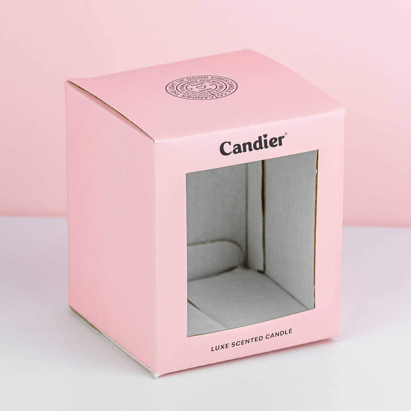 Candier congratulation candle with "Congrats" inscription, white wax, and simple design, perfect for celebrating special achievements.