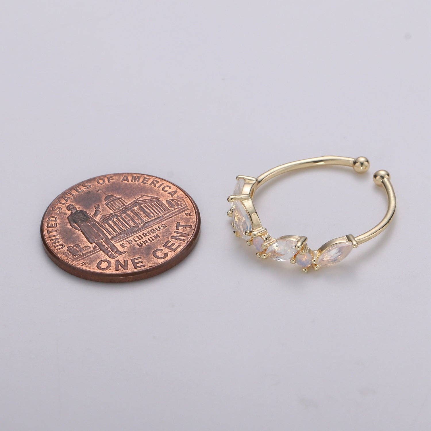 Dainty Marquise Ring in a delicate setting, featuring a sparkling marquise-cut stone and elegant band design.