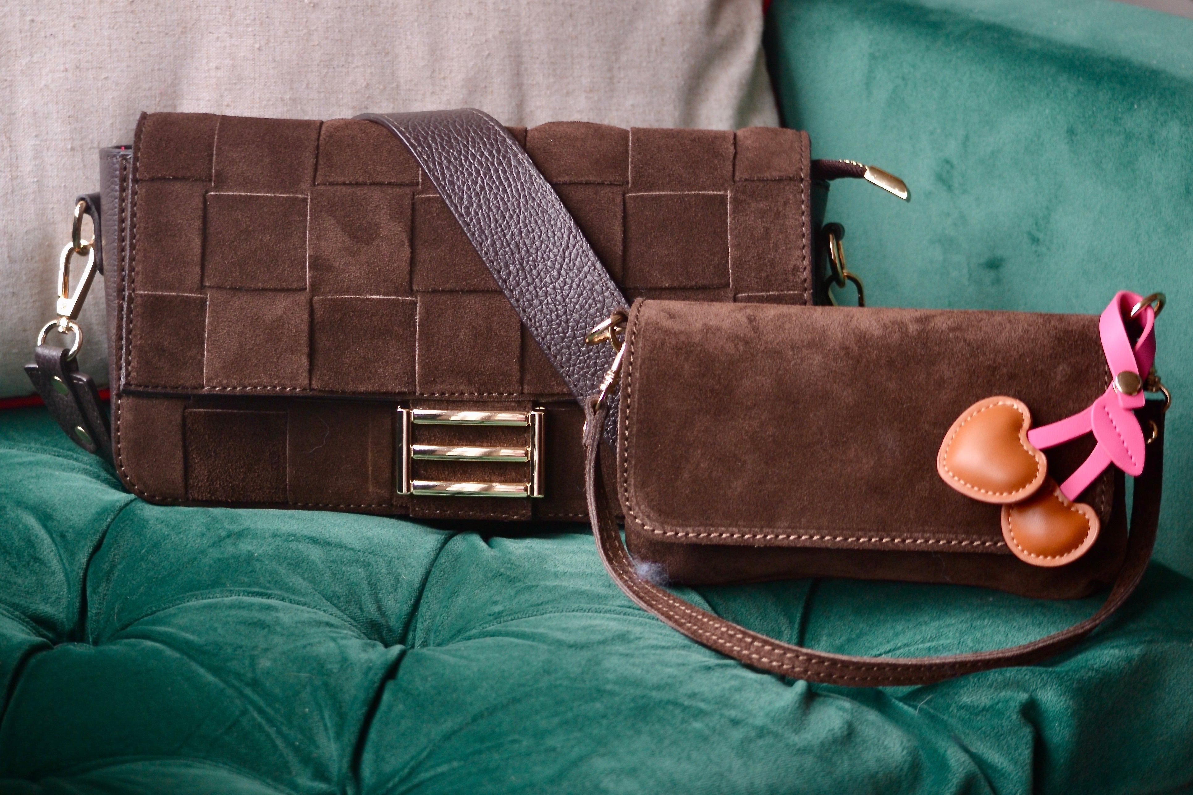 Mini suede shoulder bag in brown with a crossbody strap, showcasing a stylish and versatile design for everyday use.