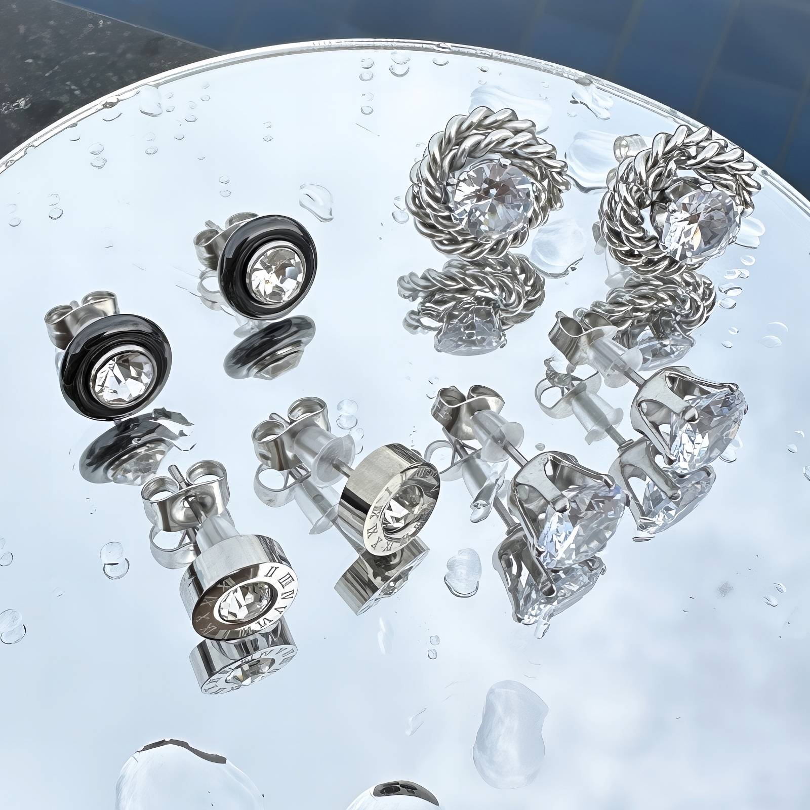 Twisted circle earrings made of stainless steel, featuring a sleek and modern design for everyday wear.