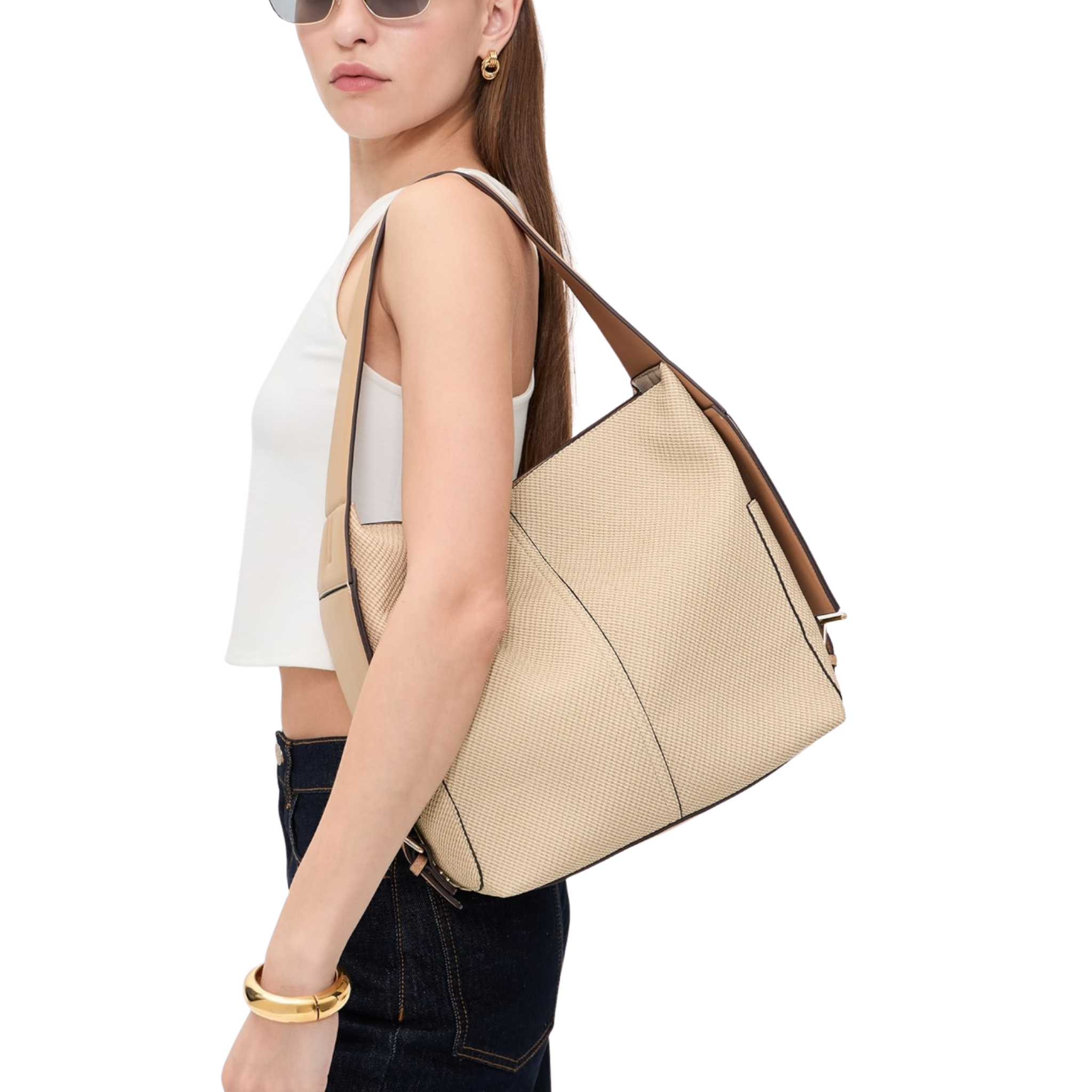 Dolce Vita Annalise mixed media shoulder bag featuring a sleek design with contrasting textures and adjustable strap.