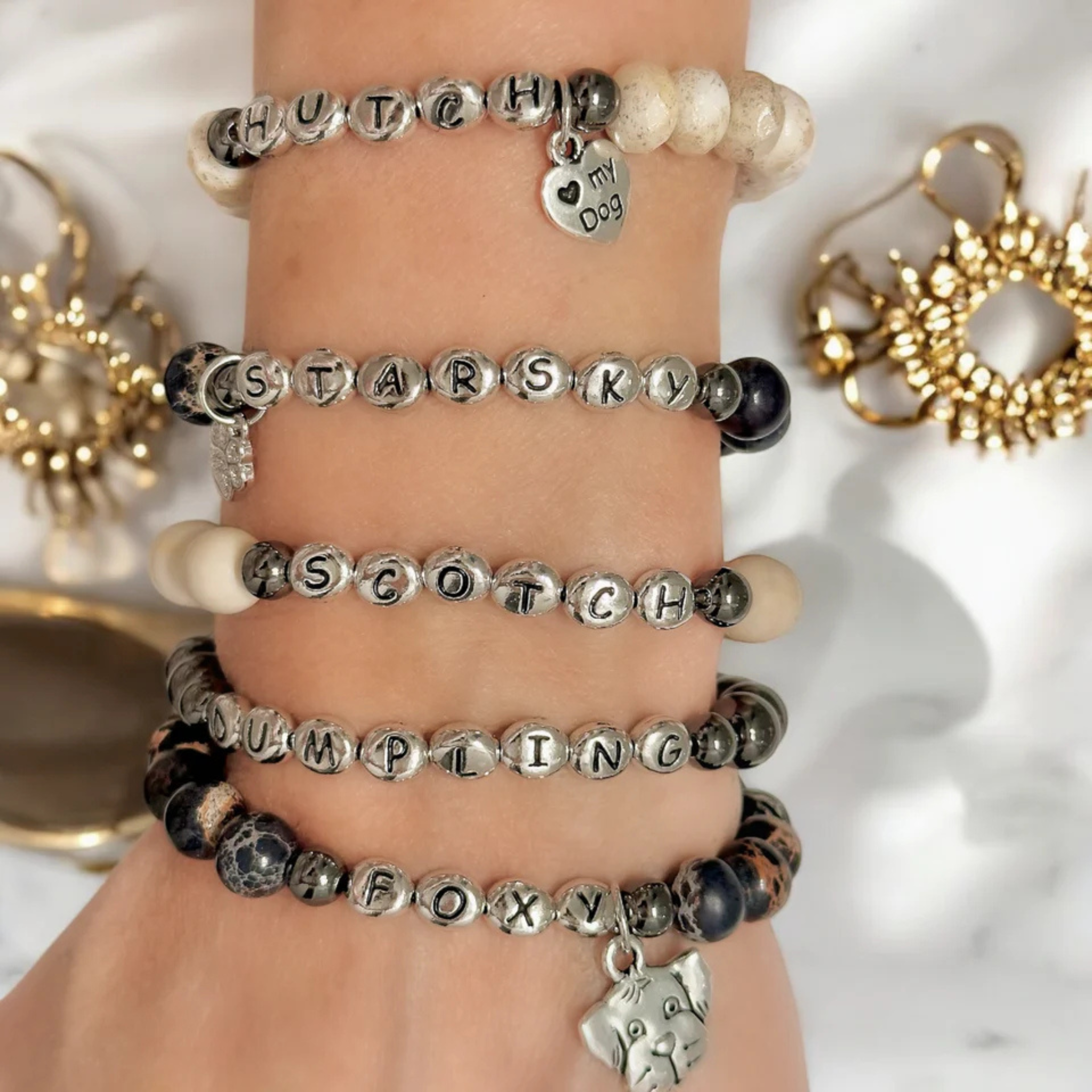 Personalized Carrie Dog Lover Bracelet by Love Lisa X Lets Bag It featuring engraved dog paw and heart charms on a silver bracelet
