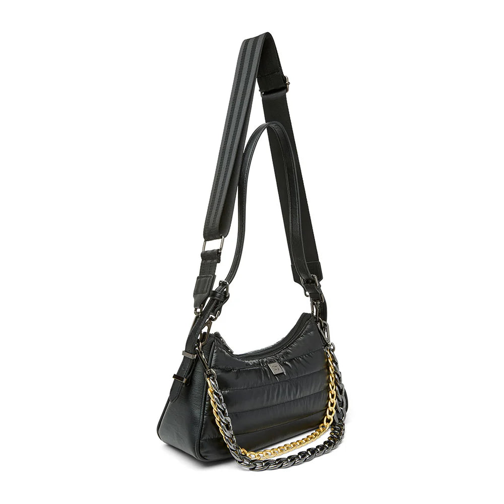 Think Royln Cosmopolitan bag in a stylish design, showcasing its unique shape and color details.