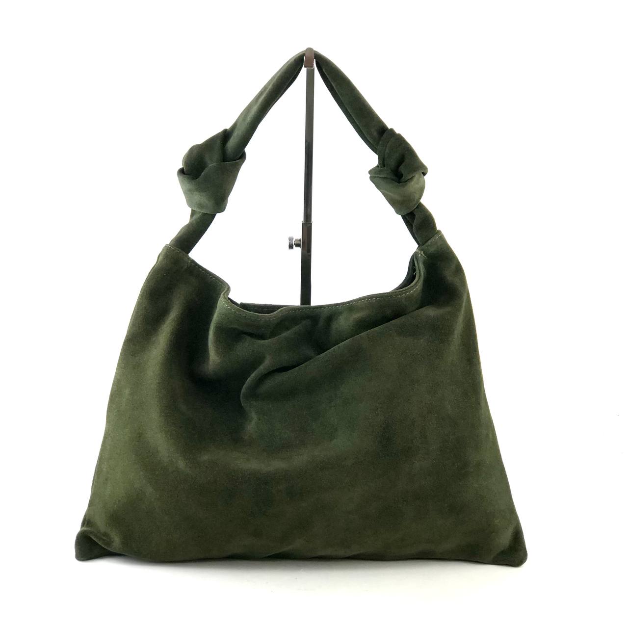 Leena double knot suede shoulder bag in soft suede with knotted detailing and adjustable strap.
