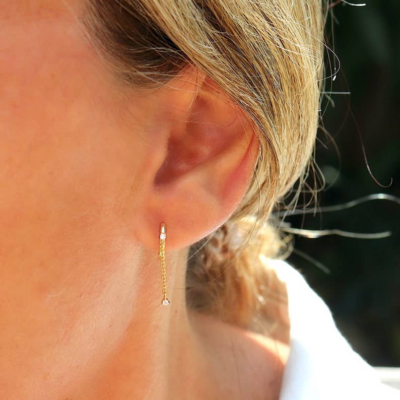 HoopLa huggie drop hoop earrings with chain, small gold earrings with dangling chain detail, stylish jewelry accessory