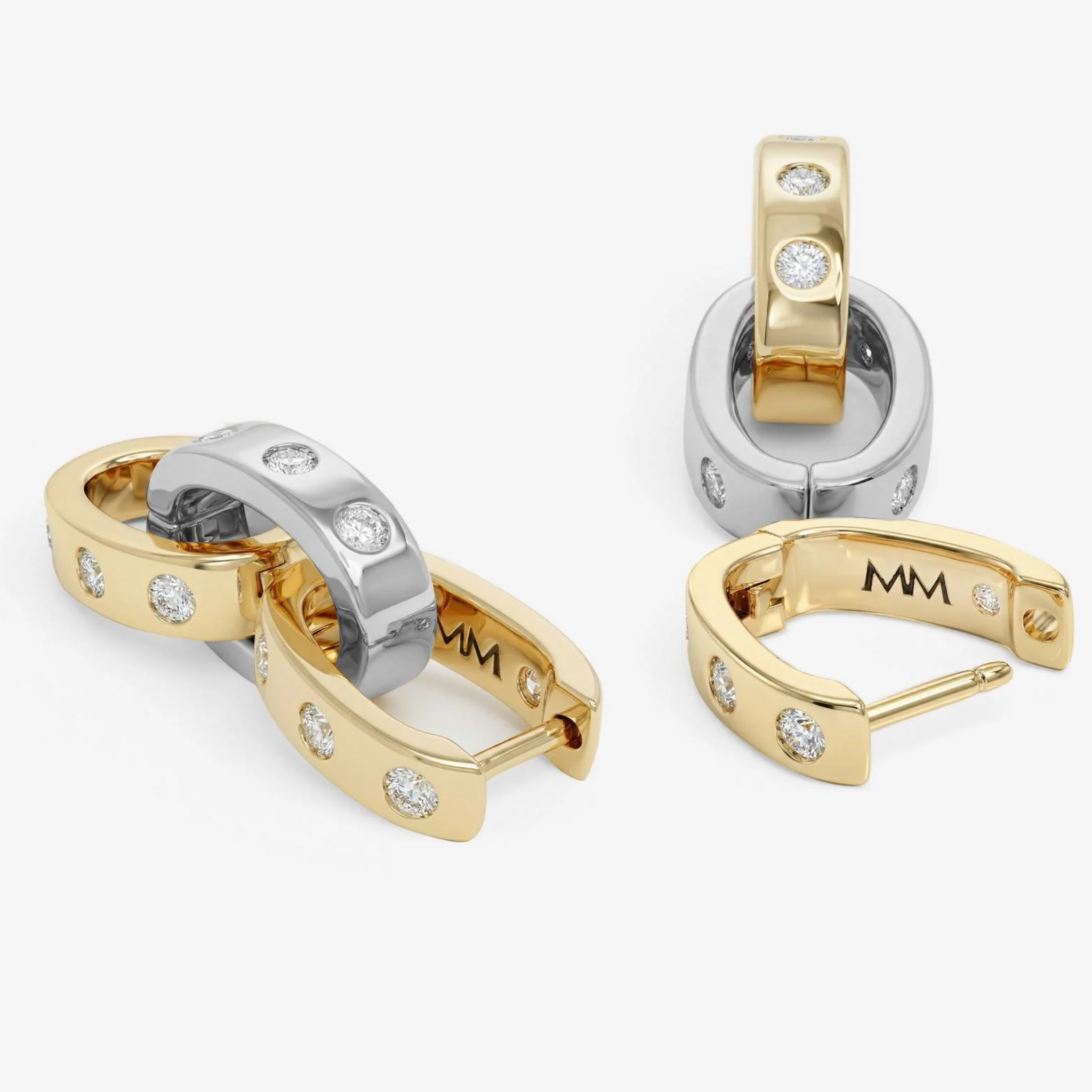 Melinda Maria Ashley Chain Convertible Earrings featuring sleek metal chains and versatile dangle design.