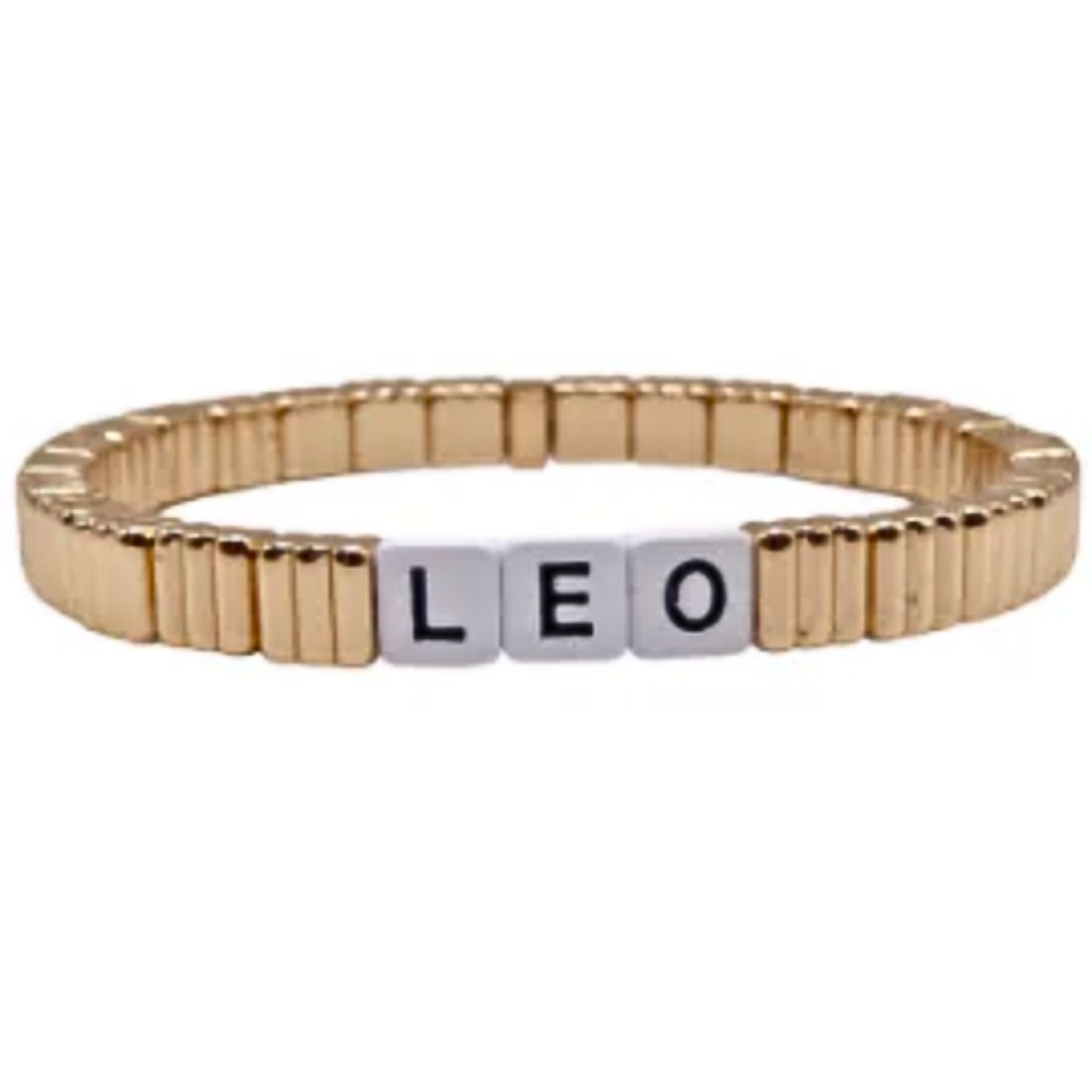 Gold line bracelet featuring stackable zodiac sign charms by la lumiere ny on a soft fabric background.