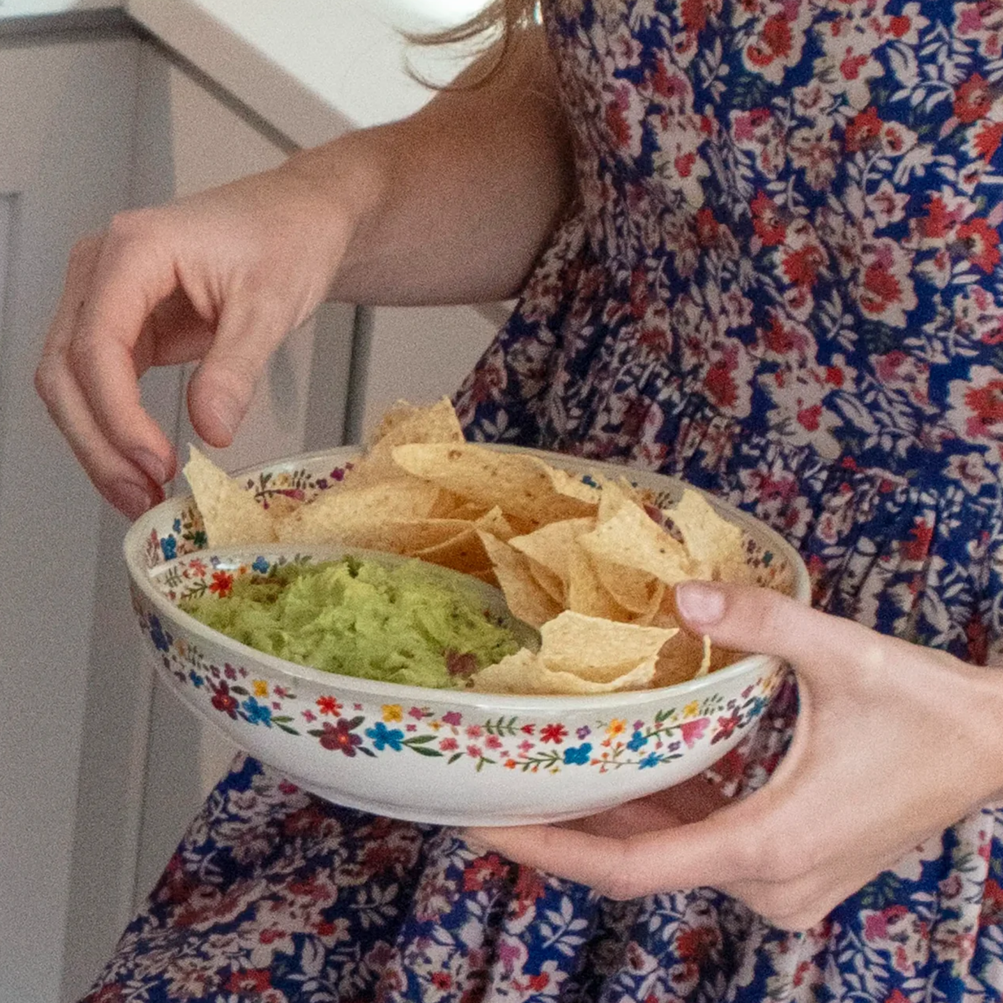 Natural Life personal chip and dip bowl set, featuring a colorful design with separate compartments for chips and dip.