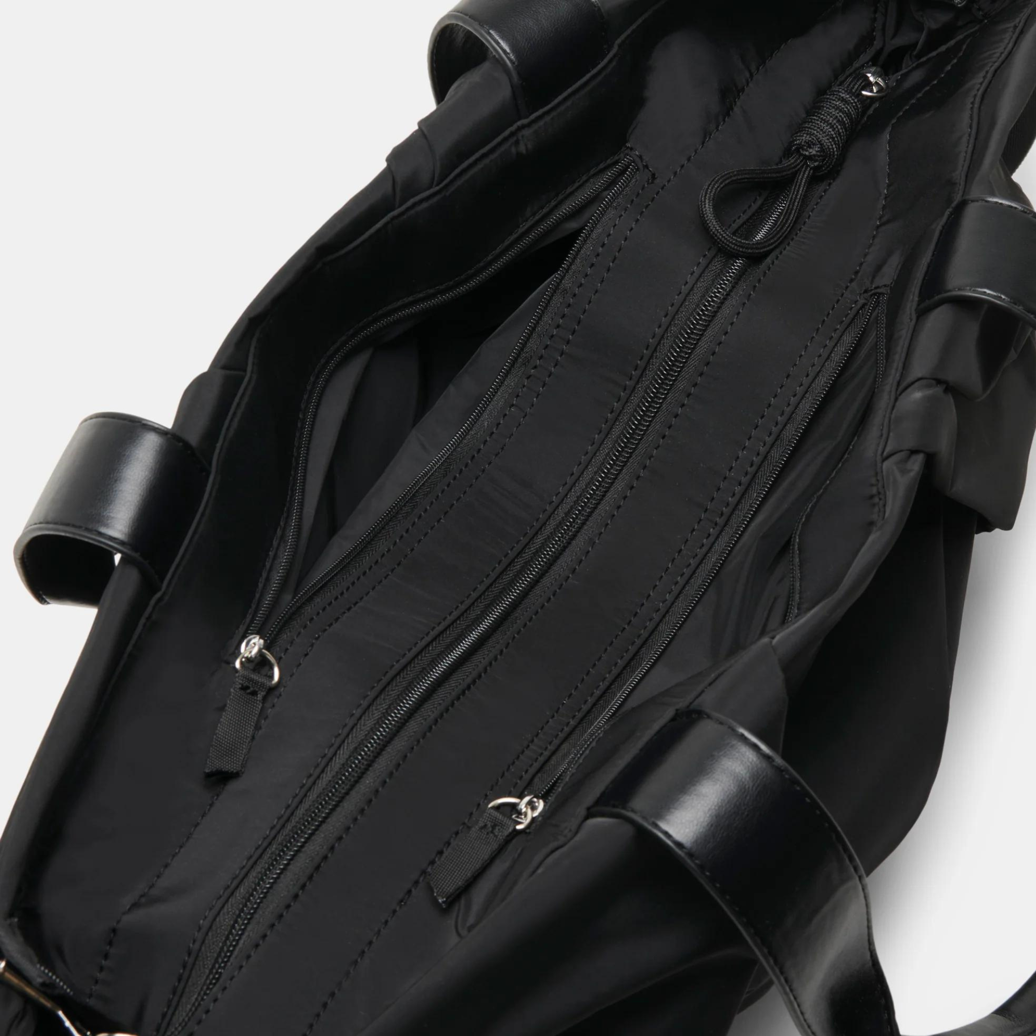 Dolce Vita Tammy Tote featuring a stylish design with spacious interior and durable handles, perfect for everyday use.