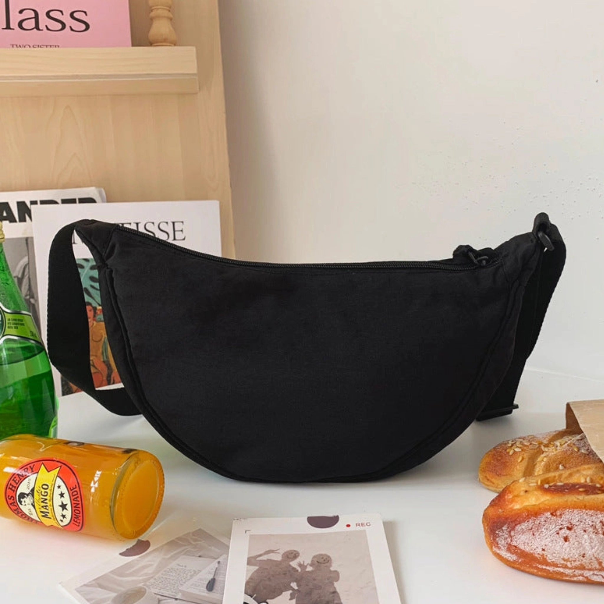 Solid color portable nylon shoulder bag from Private label, casual handbag with adjustable strap and spacious interior.