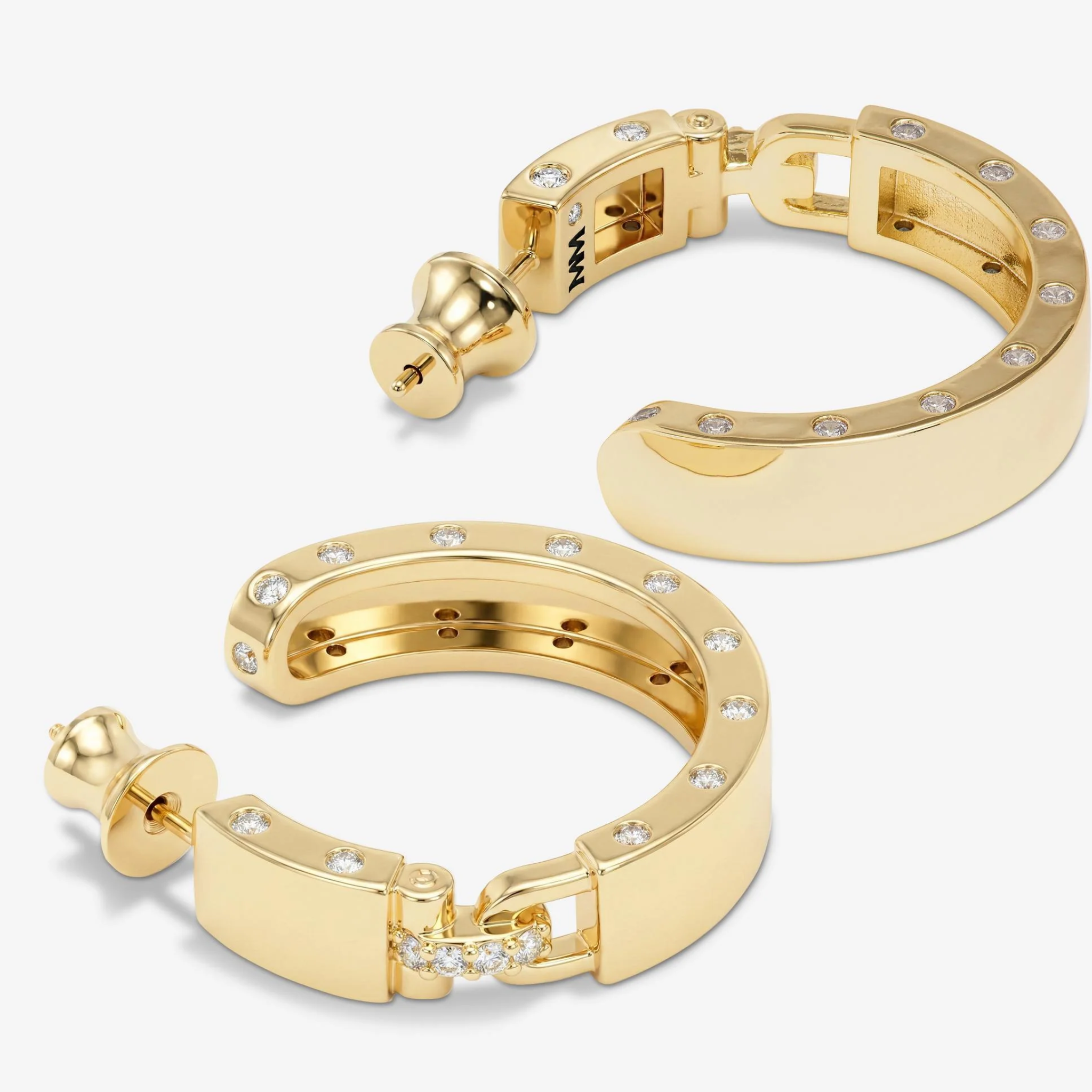 Gold Ashley Lock Hoops earrings by Melinda Maria featuring 1-inch hoops with white diamondette accents.