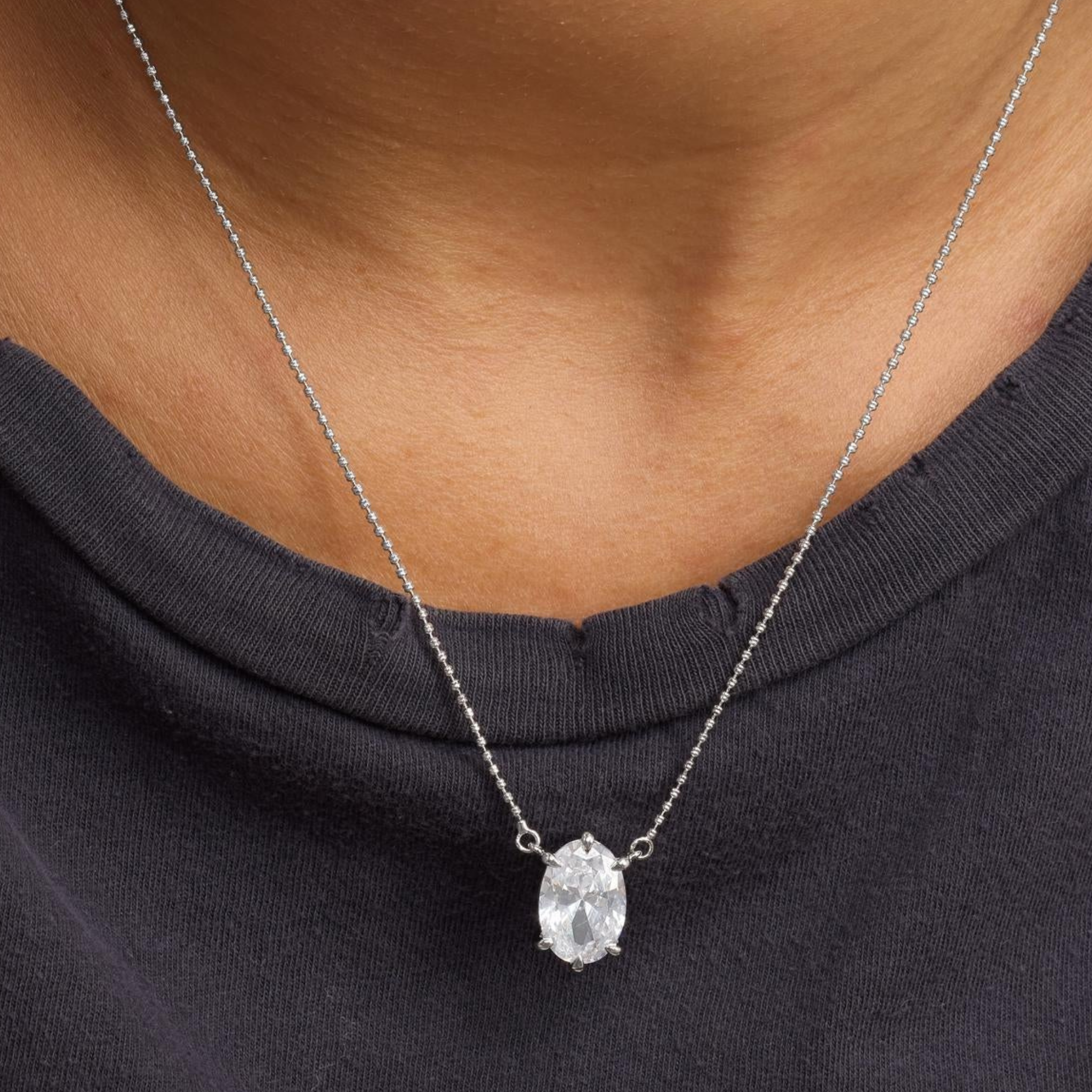 Melinda Maria She's On Point Necklace showcasing a delicate chain and stylish pendant on a white background.