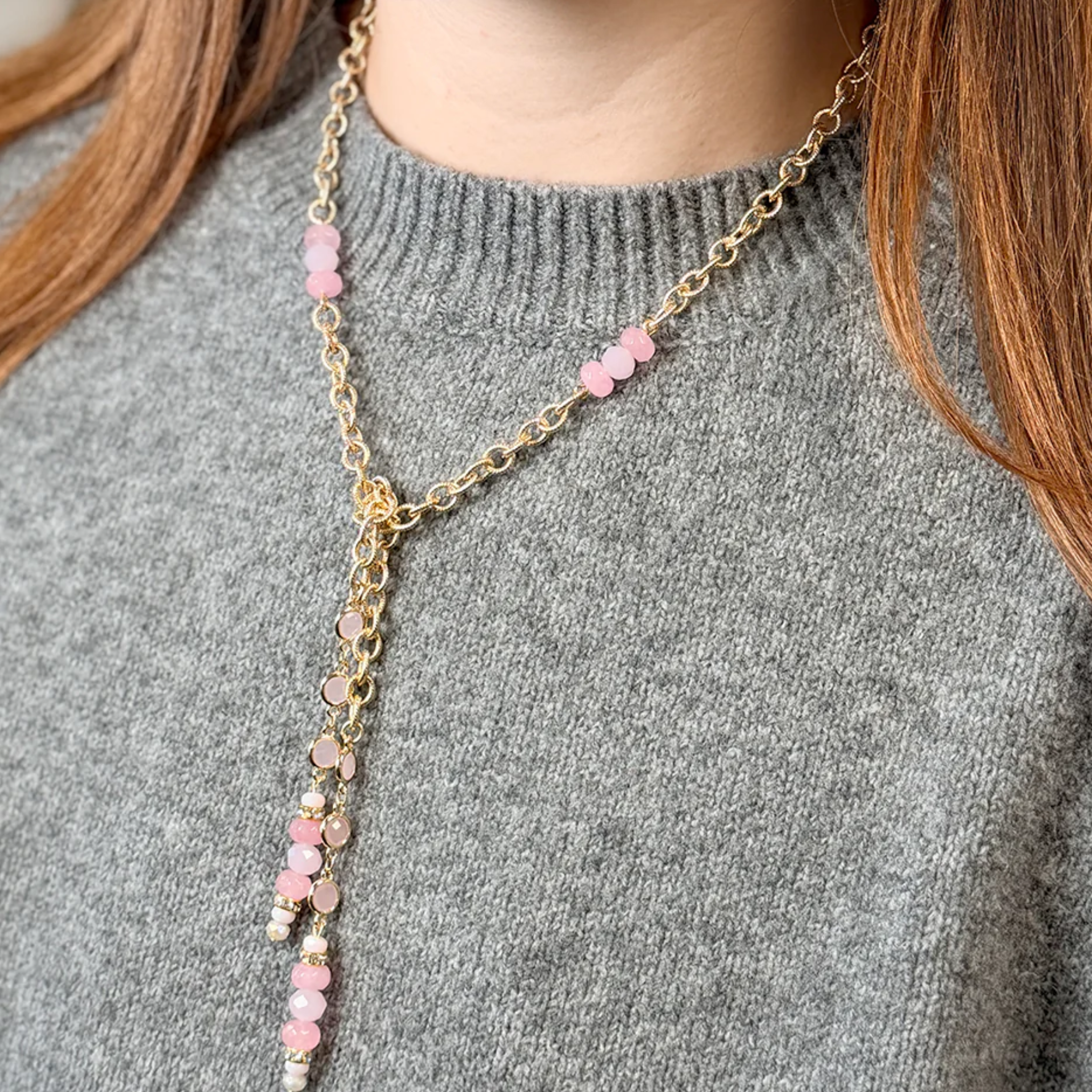 Love Lisa Serenova Lariat Necklace featuring a delicate gold chain and elegant lariat design for versatile styling.