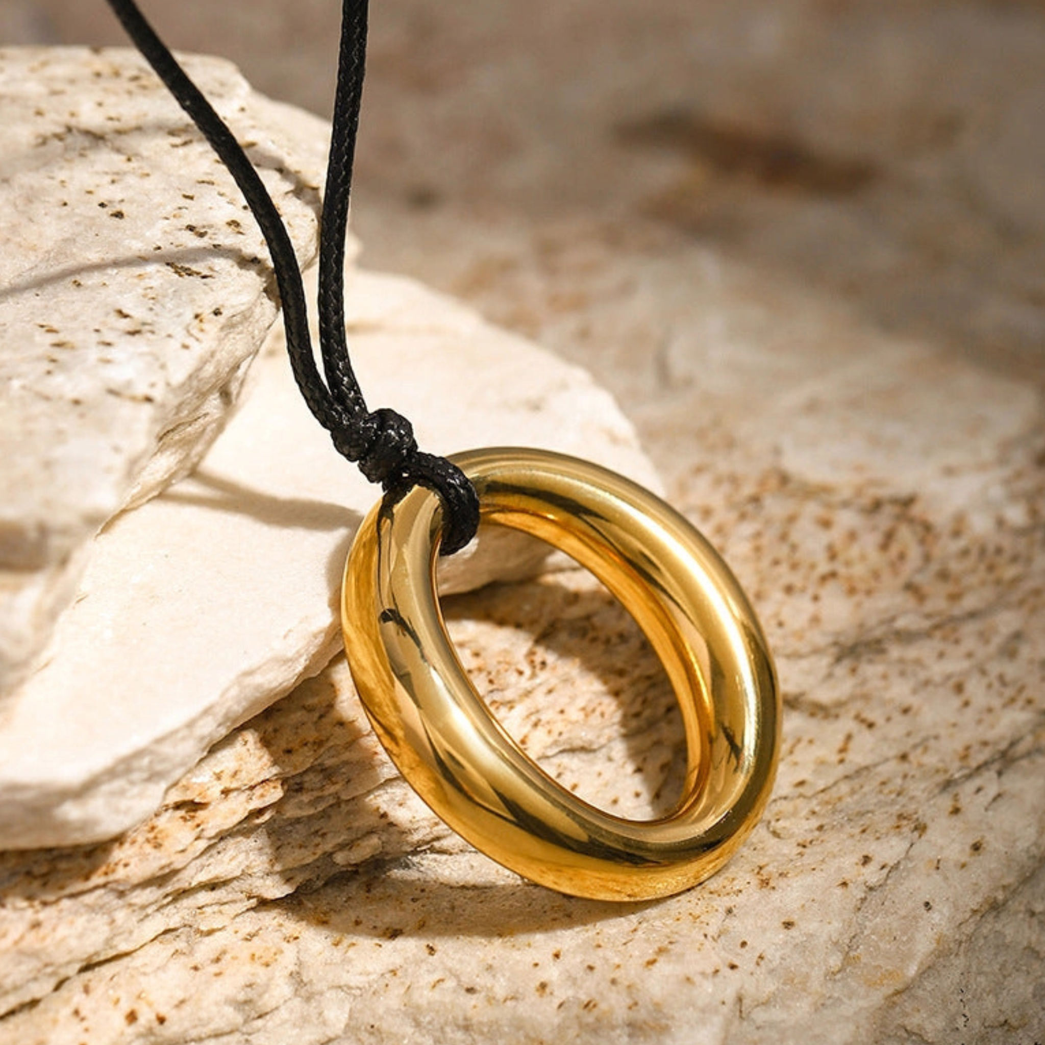 Simple round cutout titanium necklace with a sleek, minimalist design featuring a smooth titanium chain and circular pendant.
