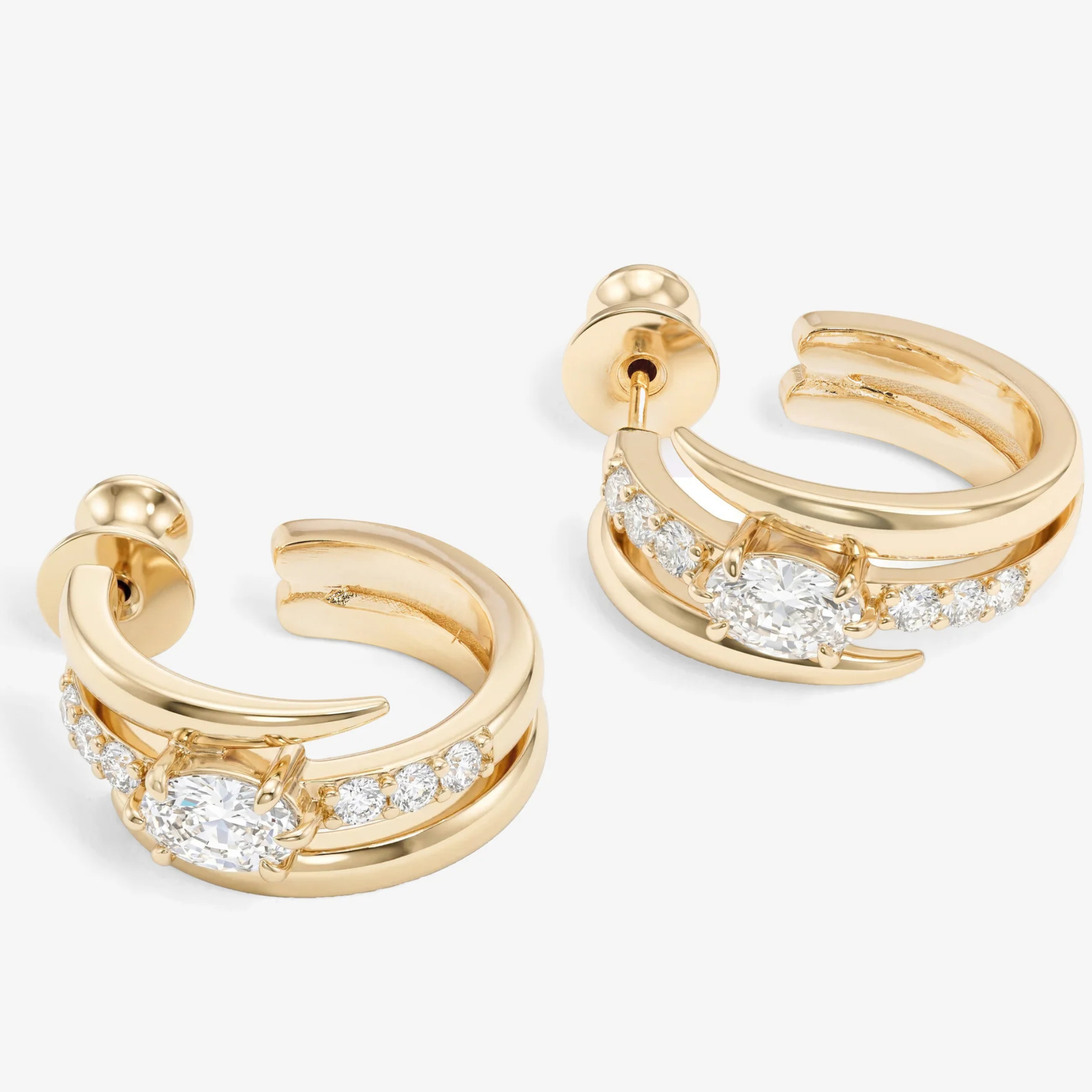 Melinda Maria She's on Point Pavé Lasso Huggies earrings with sparkling pavé stones and a unique lasso design for stylish wear
