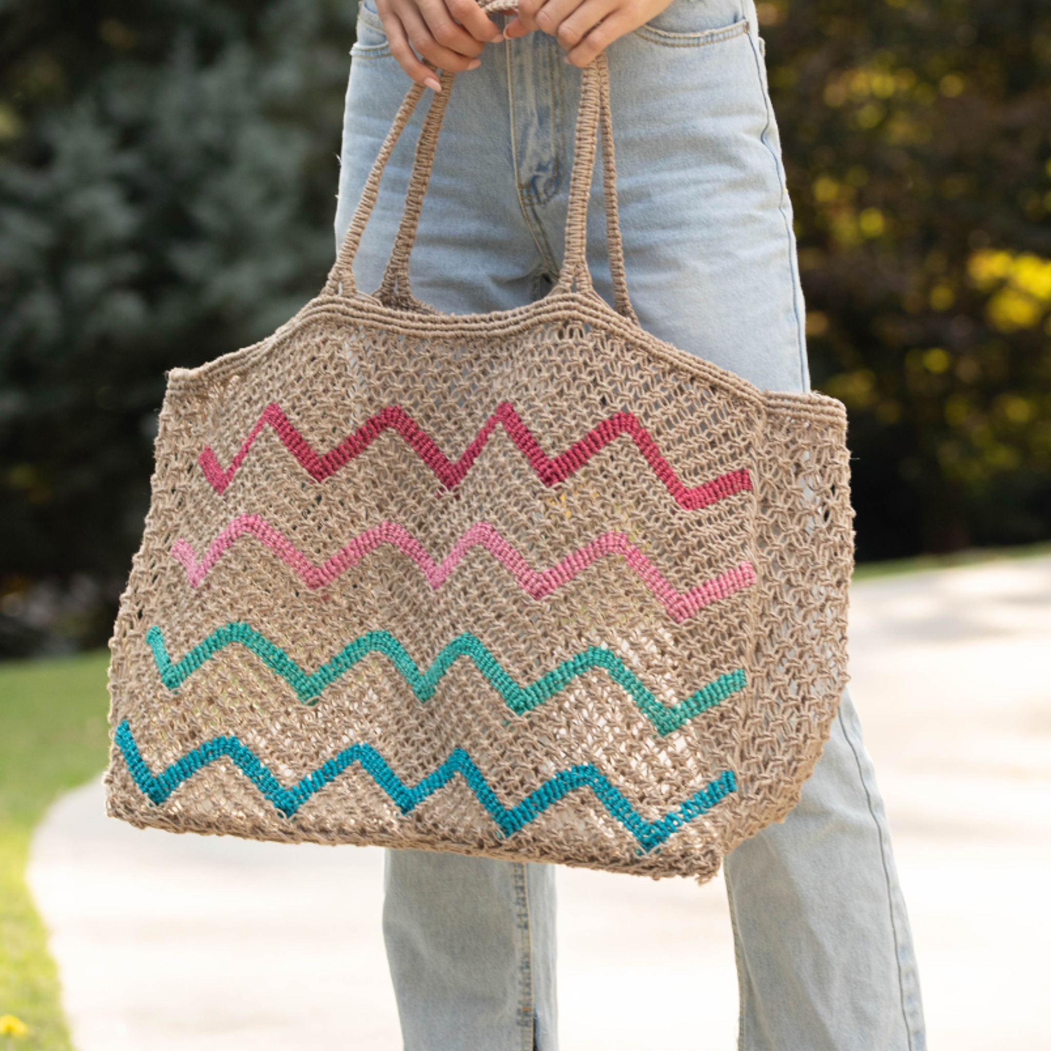 Ibiza zigzag beach tote by Anju Jewelry featuring a colorful zigzag pattern and spacious design for beach essentials.