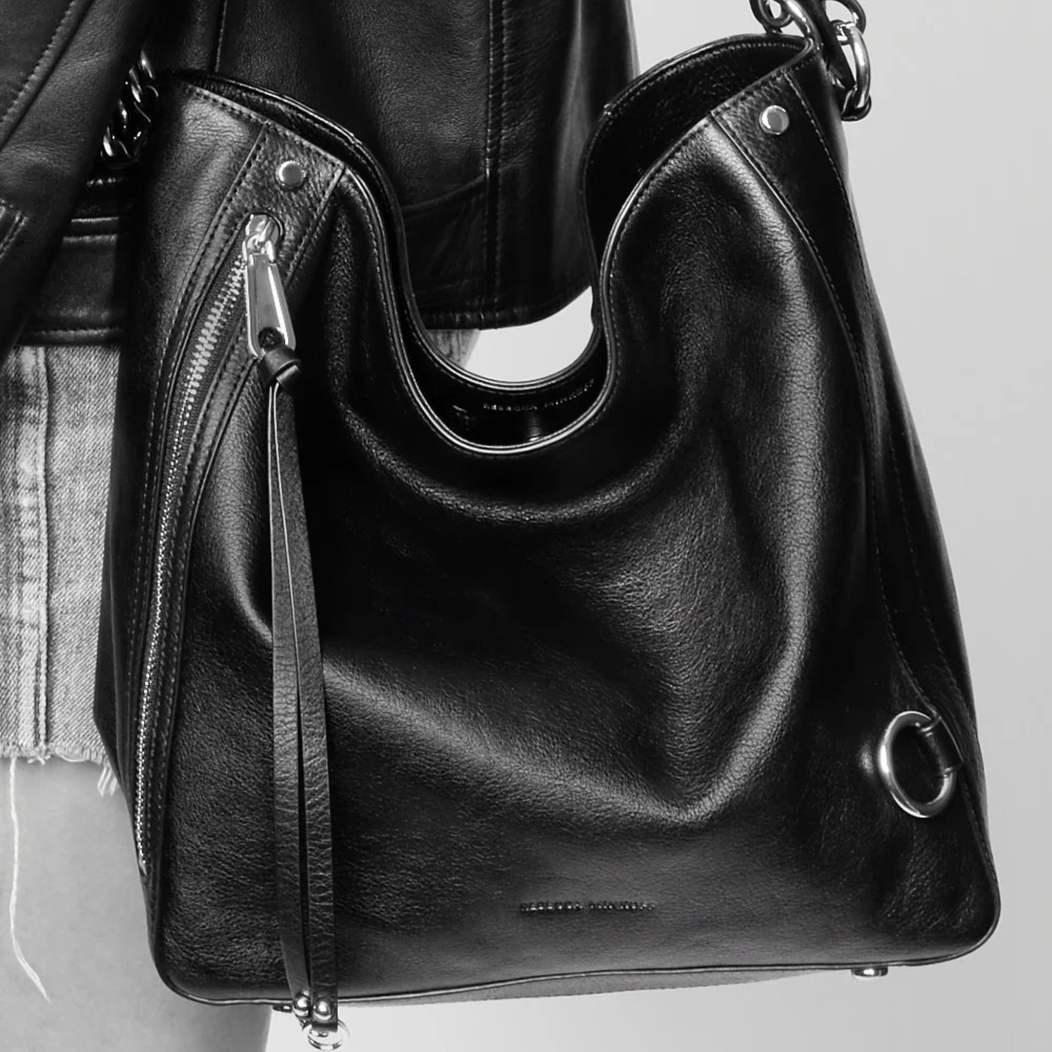Rebecca Minkoff M.A.B hobo shoulder bag with soft leather, slouchy design, and adjustable strap.