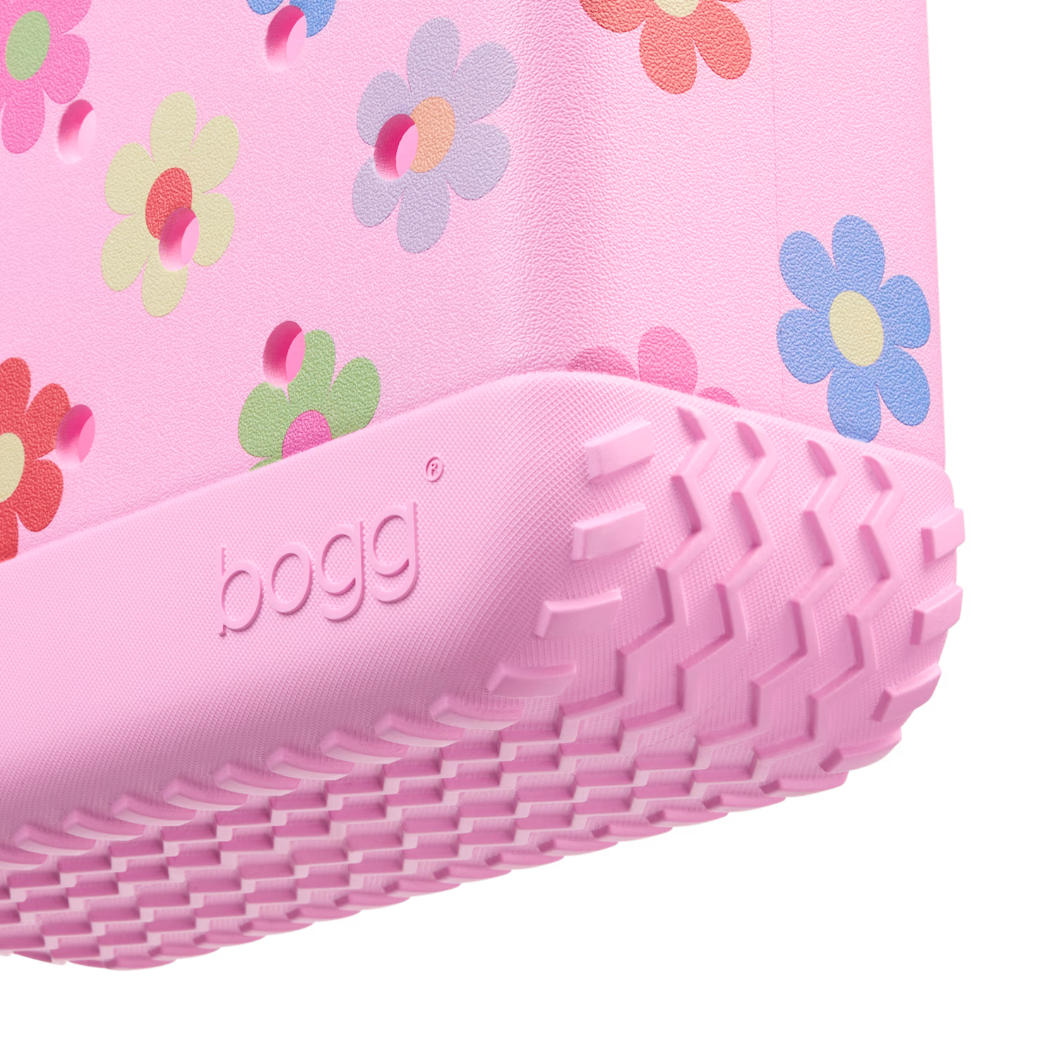 Close-up of the BOGG BAGS Bitty Bogg® Bag showing its compact design and textured material in natural light.