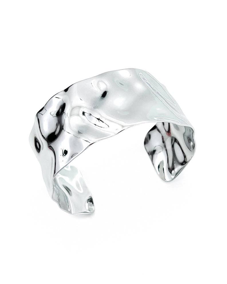 BELJOY Billie Wave gold and silver cuff bracelet with sleek wave design, showcasing a stylish mixed-metal accessory.