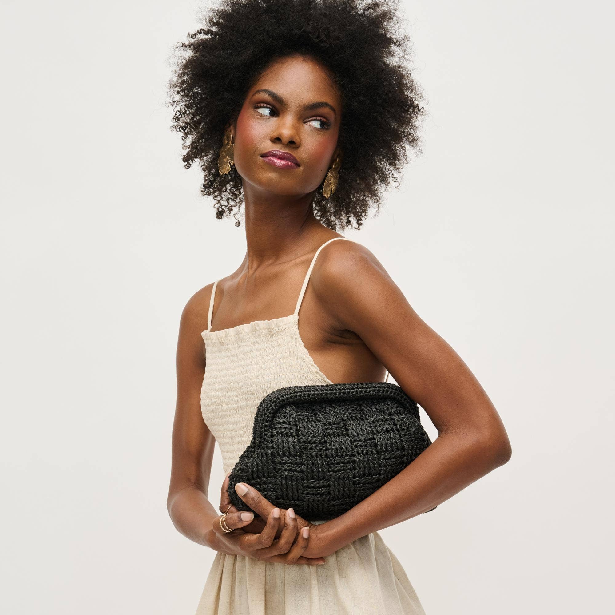 Urban Expressions Annie Clutch in stylish design with a sleek finish and elegant hardware details.