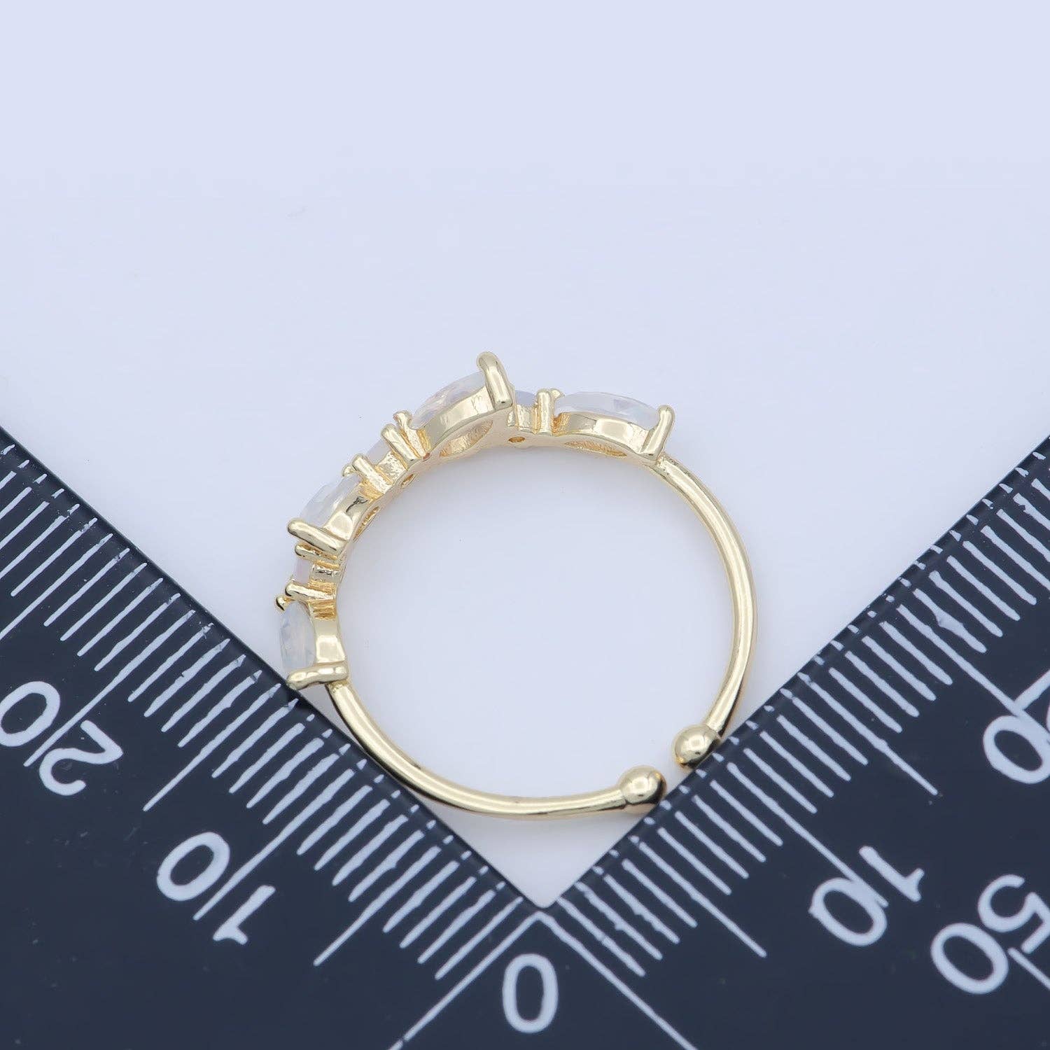 Dainty marquise ring featuring a delicate design, crafted in fine metal for an elegant look.
