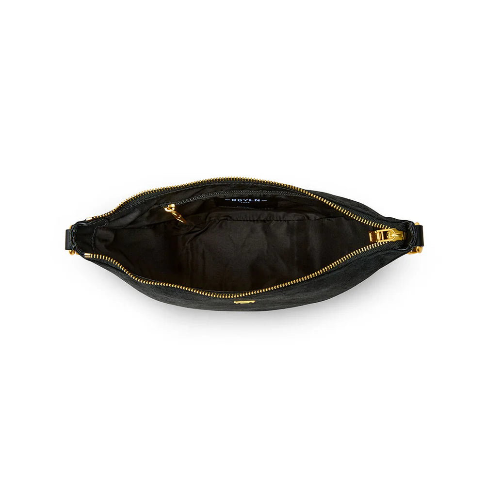 Think Royln Moonbeam bag with sleek black design, featuring stylish straps and a compact, modern silhouette.