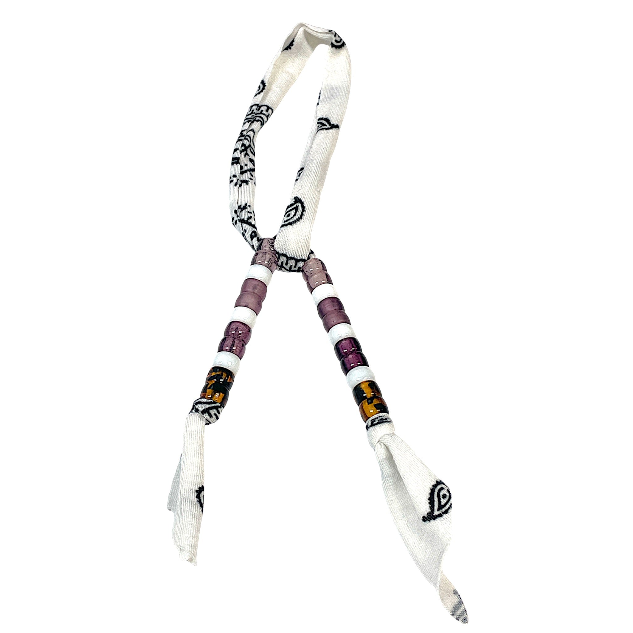 Beadstein x Lets Bag It beaded bag charms with colorful beads and decorative designs hanging from a strap.