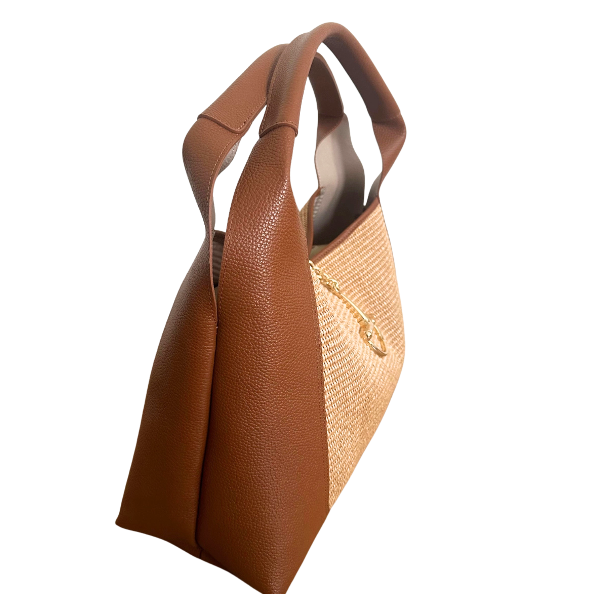 Private label The Riviera Tote handbag with woven straw and leather accents, featuring dual top handles and spacious interior.