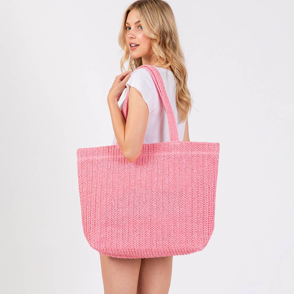 Solid crochet straw tote bag, private label beach handbag with woven design, perfect for casual outings and seaside trips.