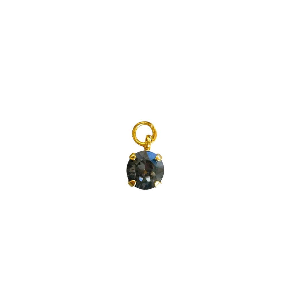 Black patina crystal charm designed for hoops and necklaces, featuring a unique shape and sparkling details.