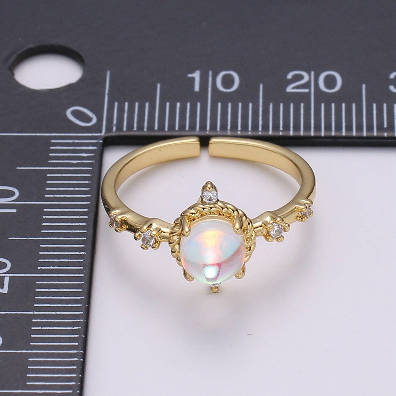 Dainty moonstone celestial adjustable ring from a private label, featuring a shimmering moonstone and delicate design.