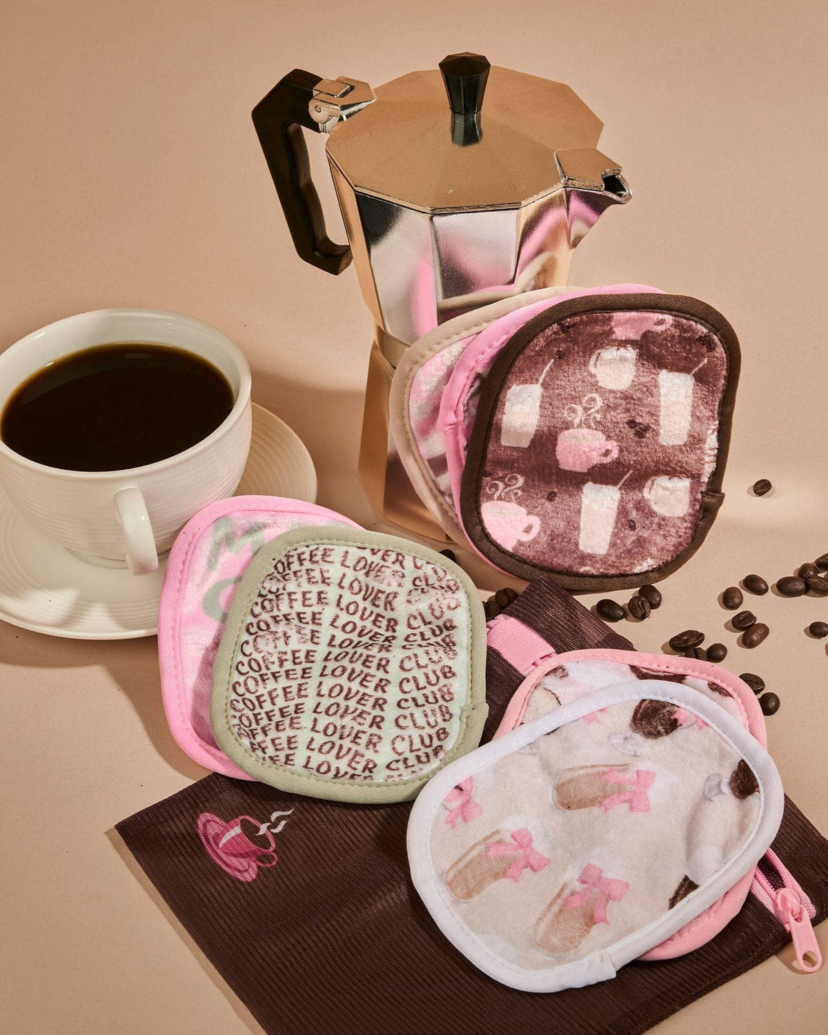 The Original MakeUp Eraser Coffee Break 7-Day Skincare Set with reusable cloths and cleansing products for daily skincare routines.