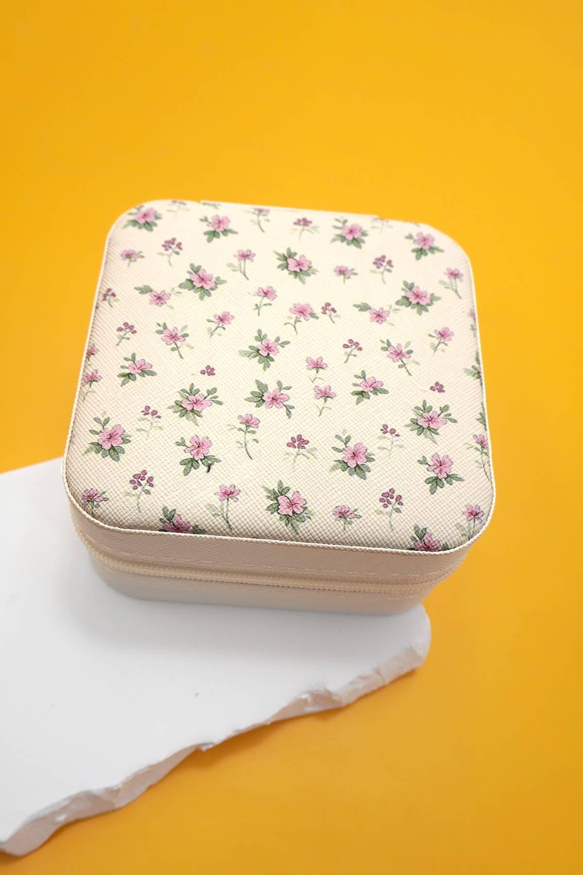 Private label Coquette jewelry organizer travel pouch with compartments for jewelry storage and secure closure.