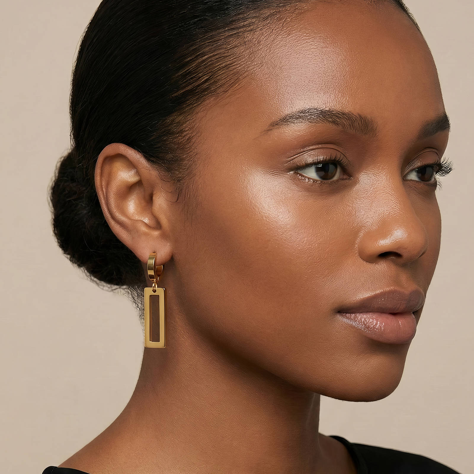 Geo rectangle drop earrings made of 18K gold plated steel, showcasing a modern design and elegant finish.