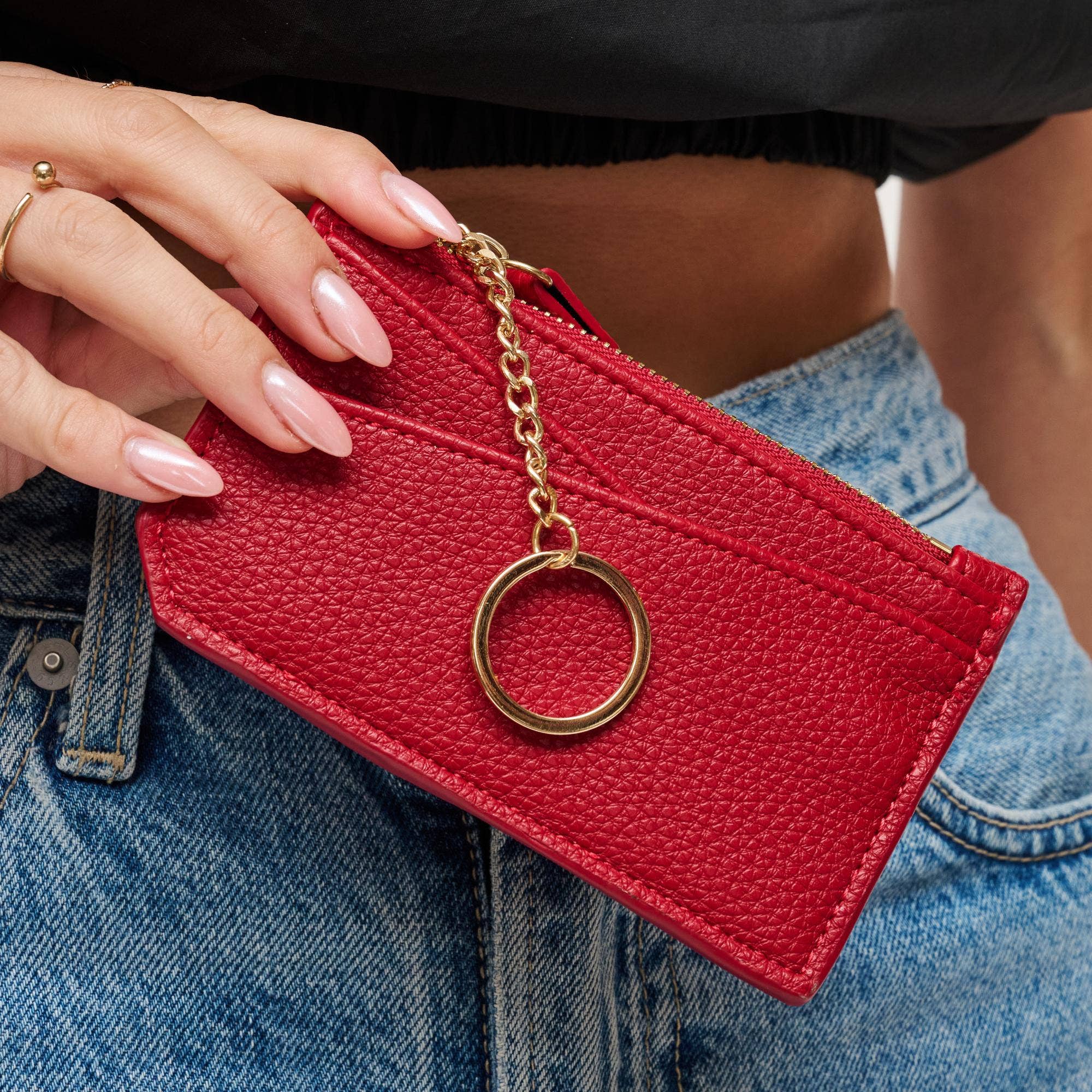Urban Expressions Adriana card holder, compact leather wallet with multiple card slots and sleek design.