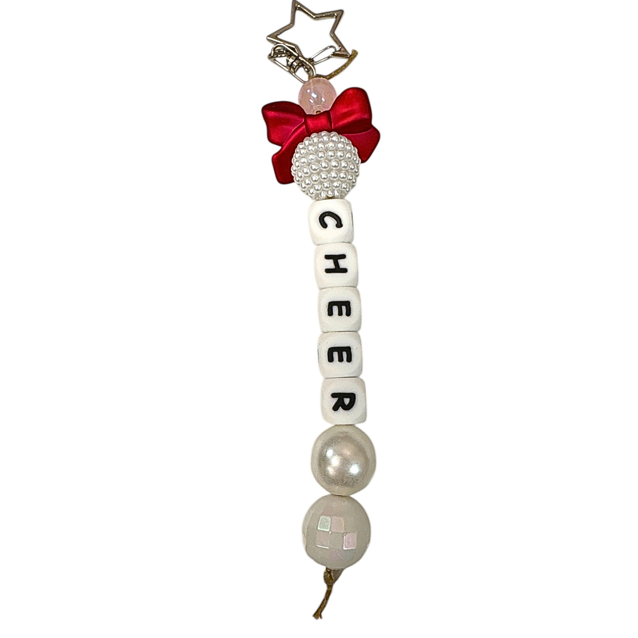 Jules by the Sea bag charms and keychains featuring colorful sea-inspired designs and playful decorative elements.