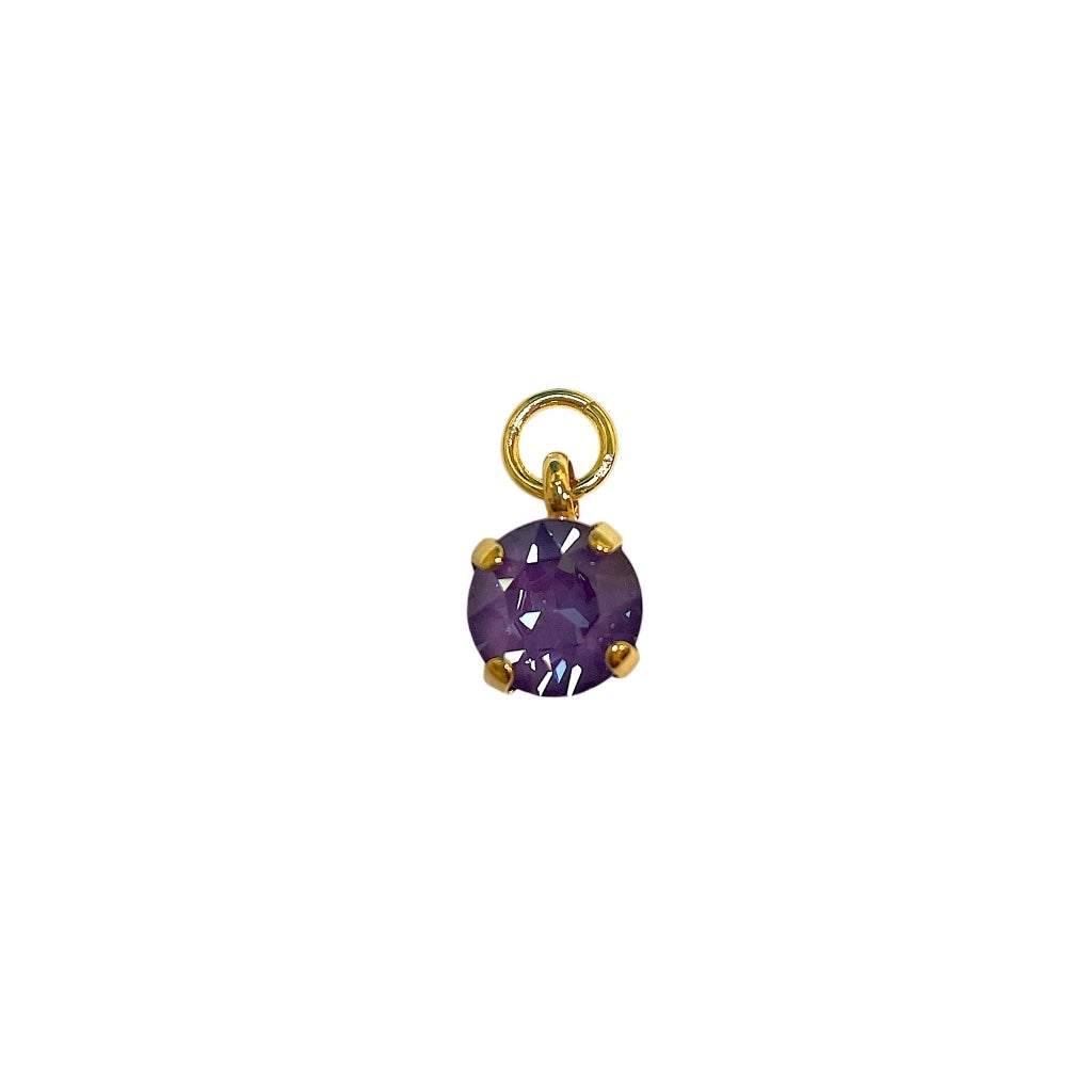 8mm light purple Swarovski crystal charm with a sparkling finish, perfect for jewelry making and embellishments.