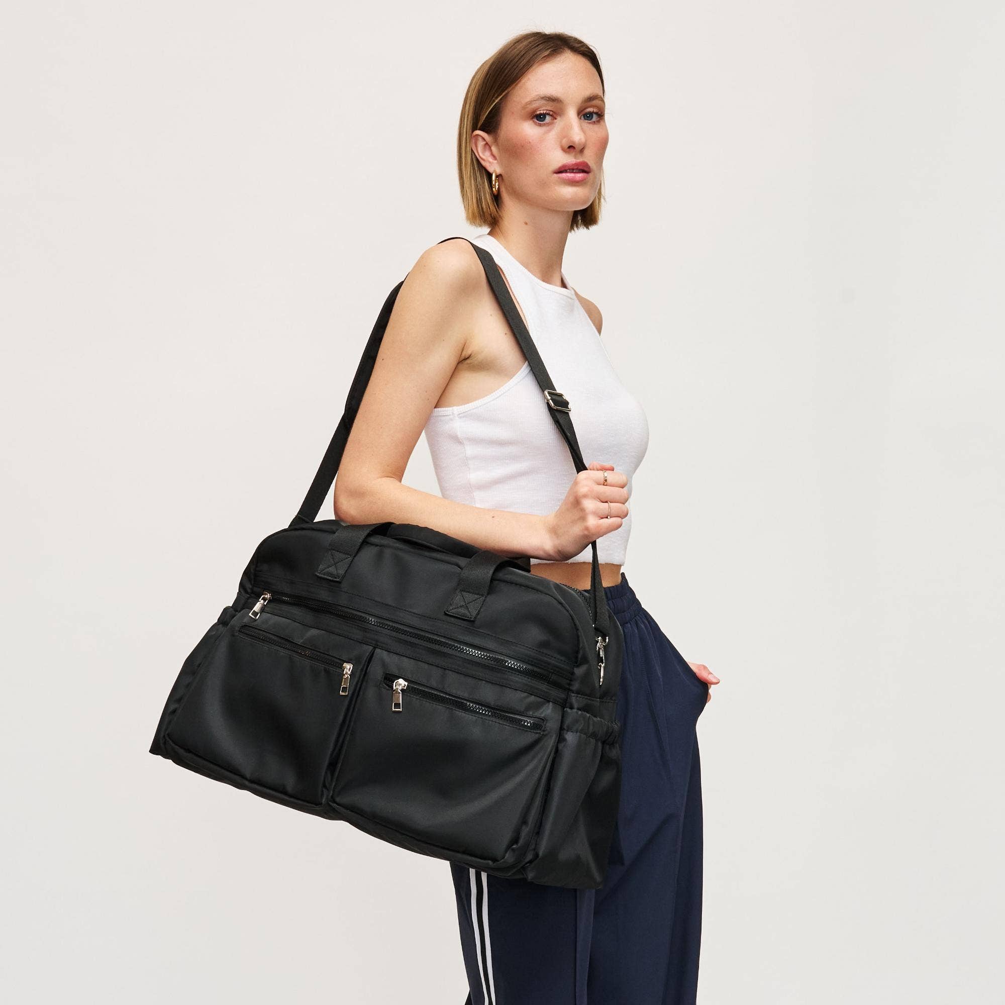 Urban Expressions Navigator Multi Compartment Weekender bag in a stylish design with multiple pockets for organization.