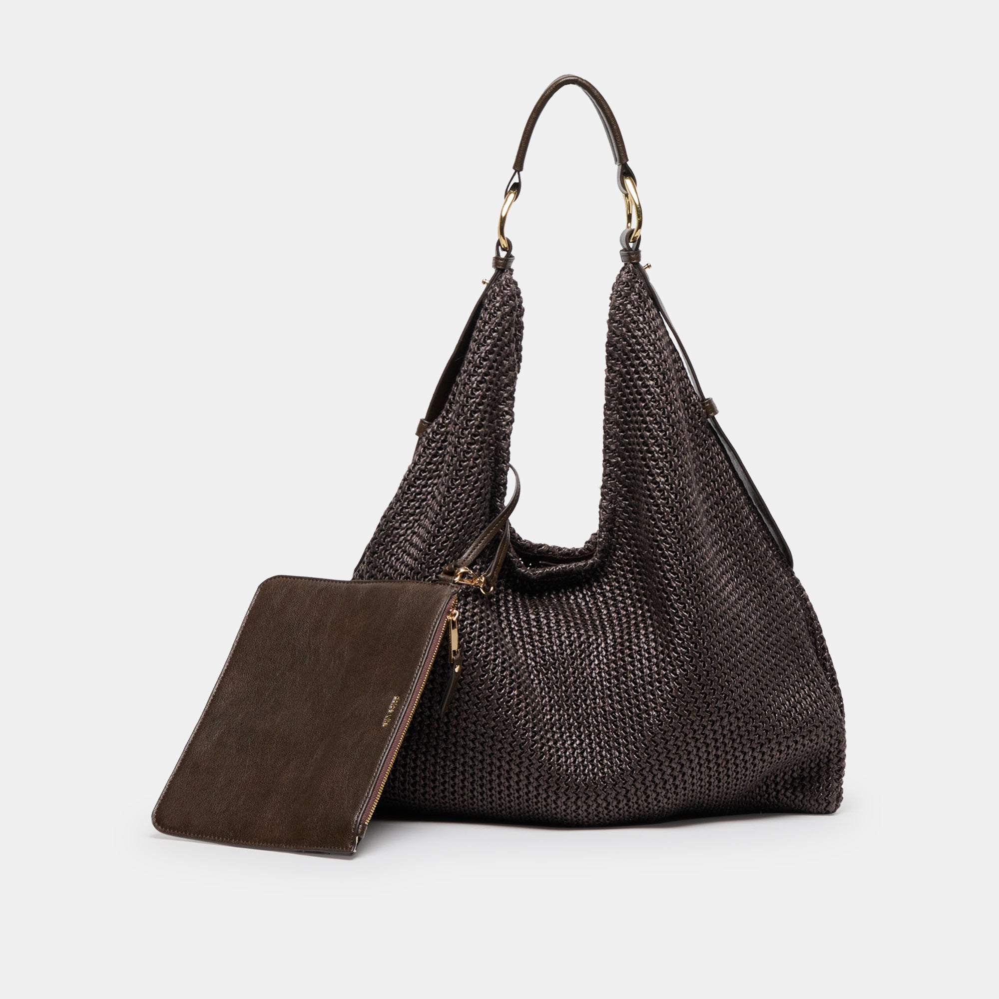 Dolce Vita Miriel Tote bag made of natural raffia with woven texture and spacious design for casual, stylish carry.